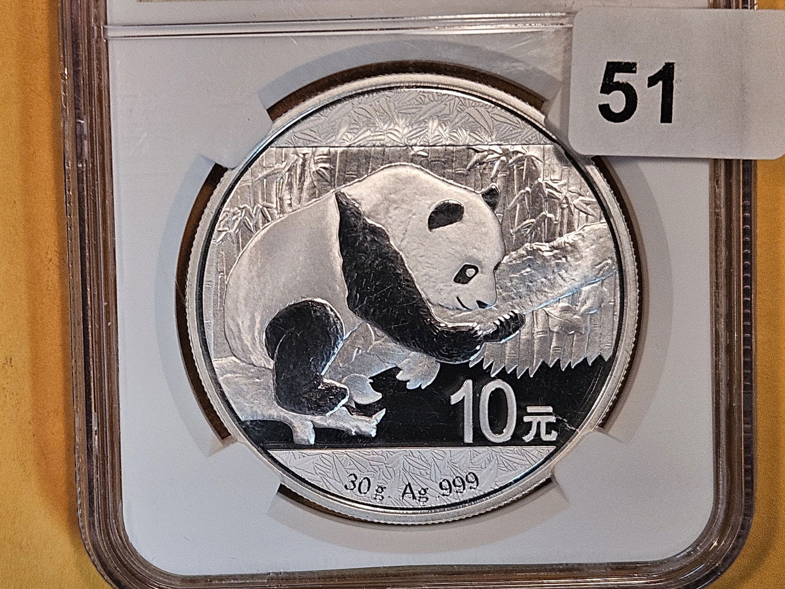 NGC 2016 China silver 10 yuan in Mint State 69 (1 of 3)