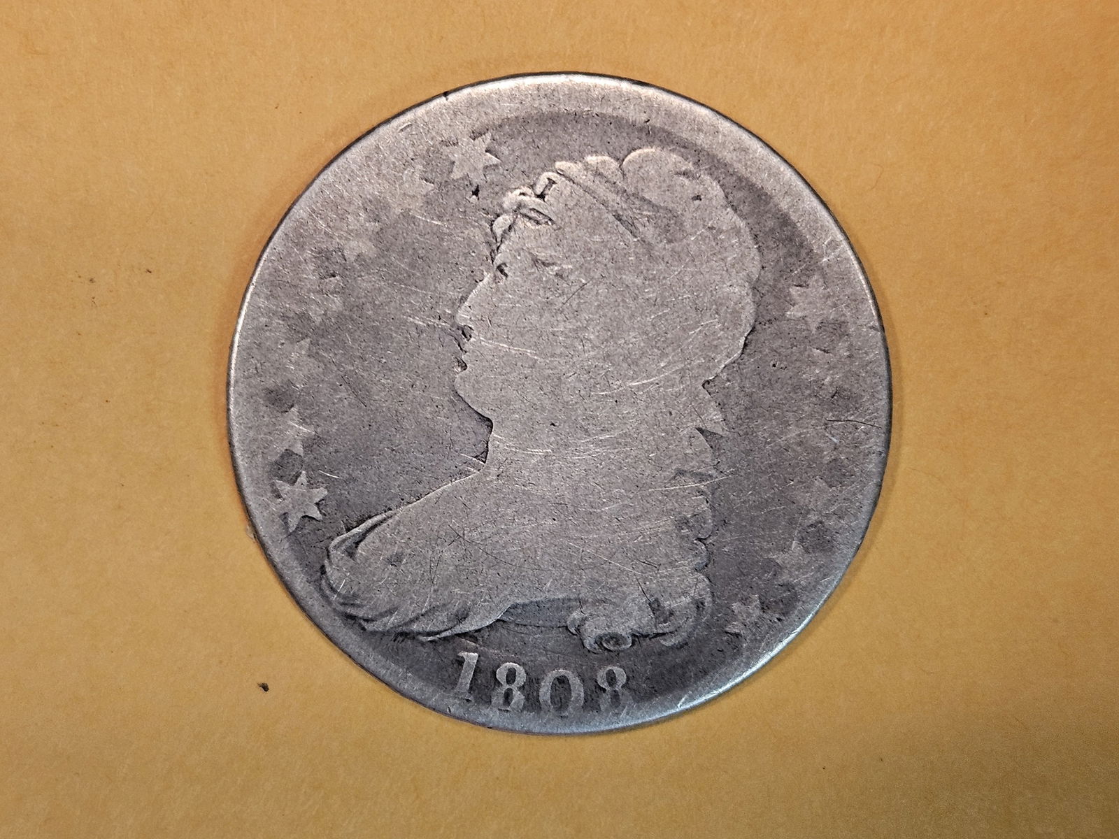 Earlier 1808 Capped Bust Half Dollar: Solid, even wear