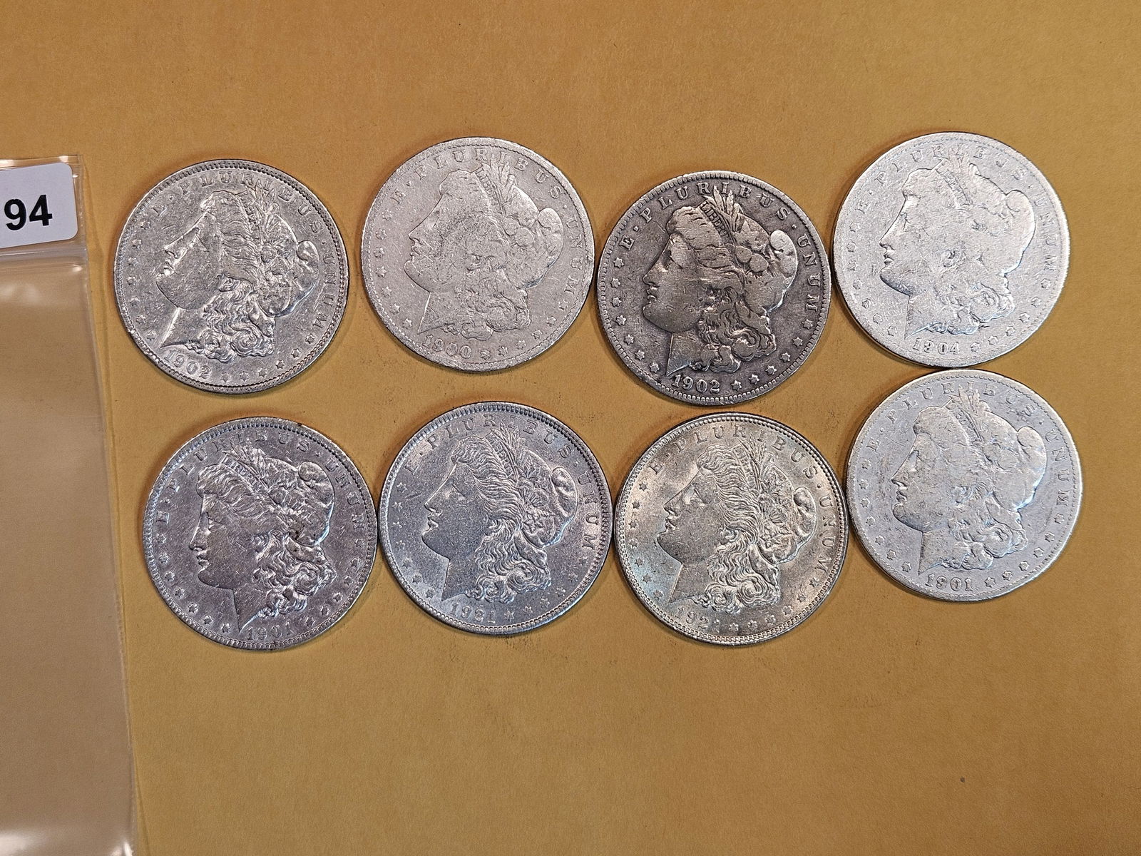 Eight mixed Morgan silver Dollars (1 of 2)