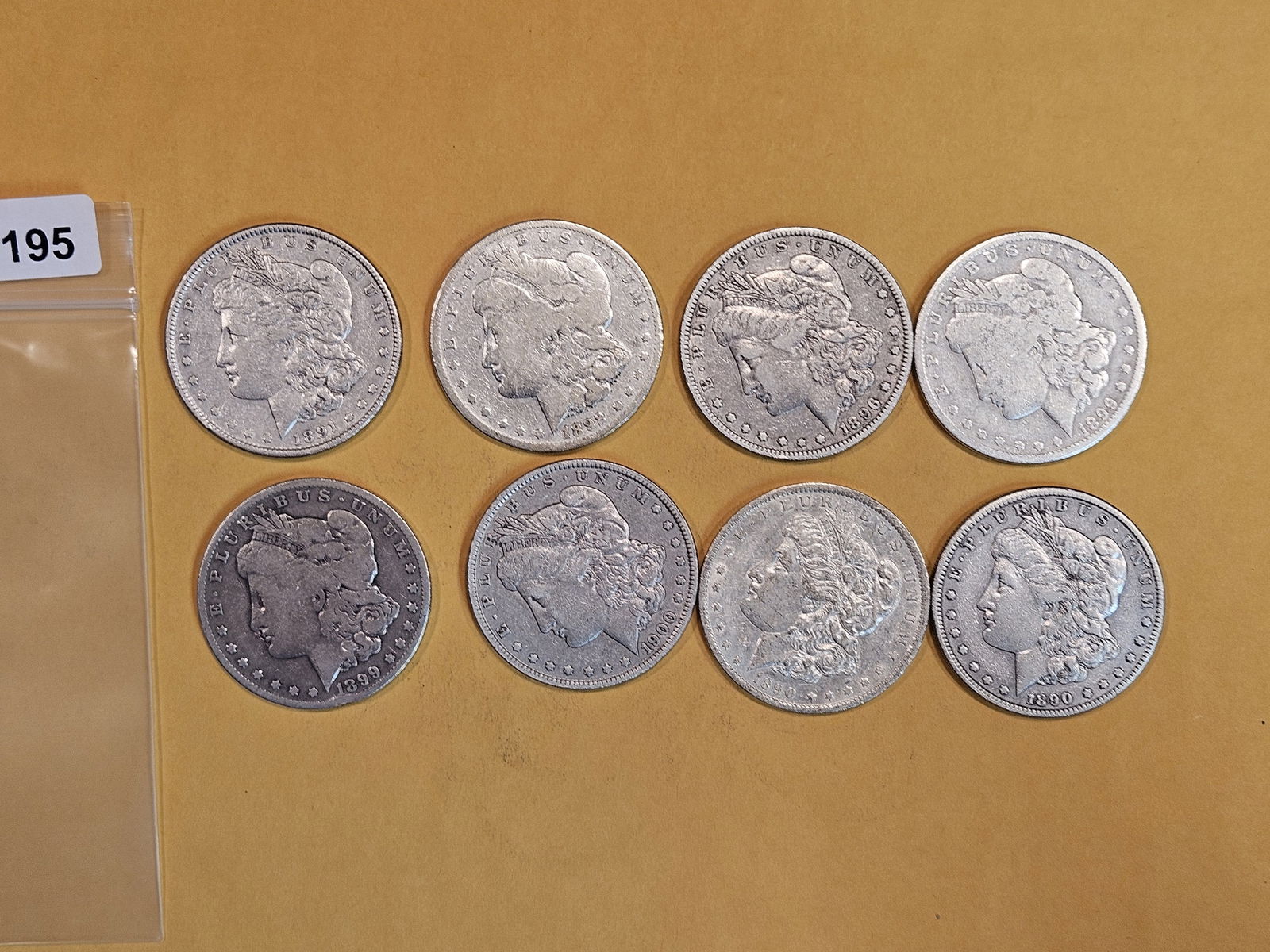 Eight mixed Morgan silver Dollars (1 of 2)