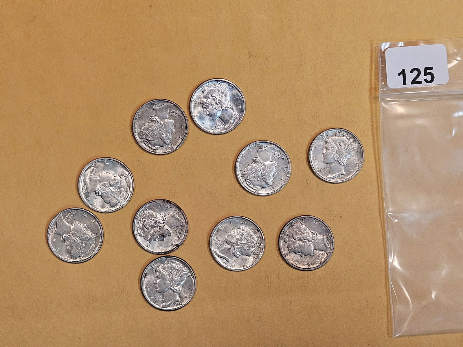 Ten mixed silver Mercury Dimes (1 of 2)