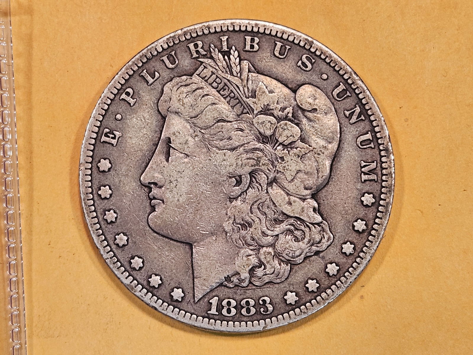 ** KEY DATE ** 1883-CC Morgan Dollar in Very Fine - 30 (1 of 3)