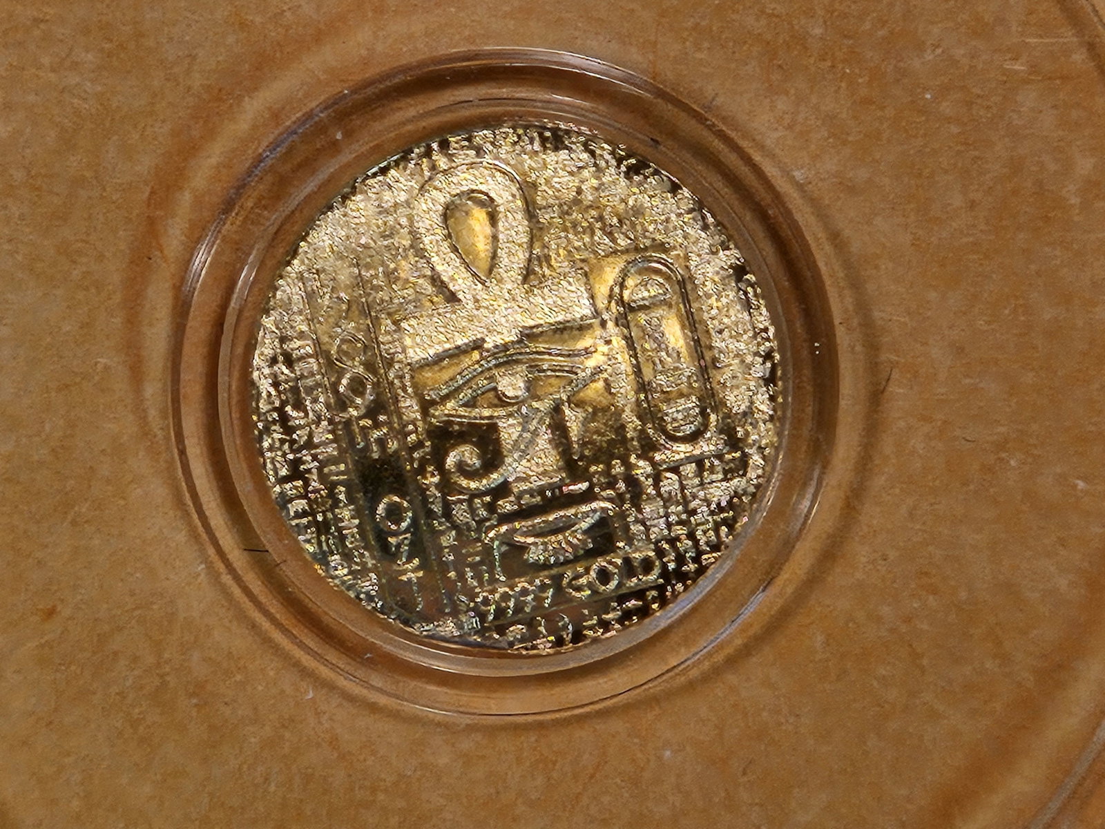 GOLD! Small .9999 fine Gold Art Round: Egyptian Hieroglyphics. Says 1/200th ounce