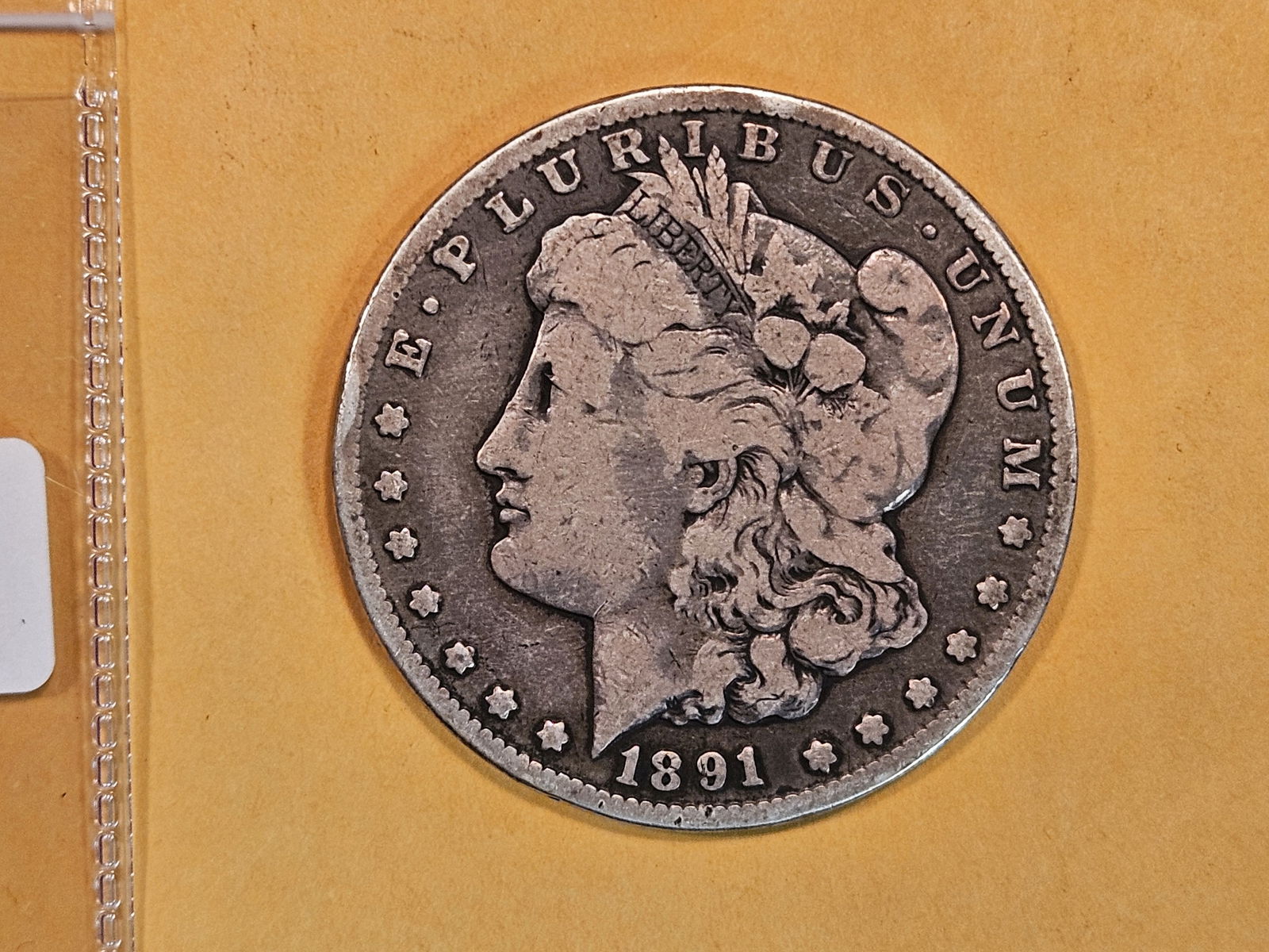 ** KEY DATE ** 1891-CC Morgan Dollar in Fine - details (1 of 3)