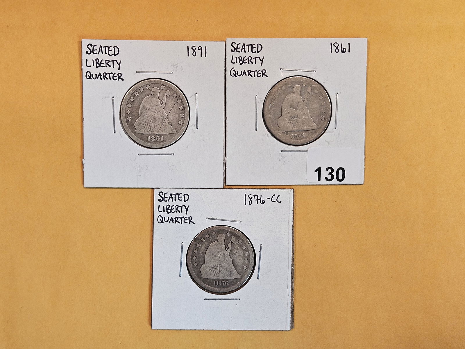 Three mixed silver Seated Liberty Quarters (1 of 3)