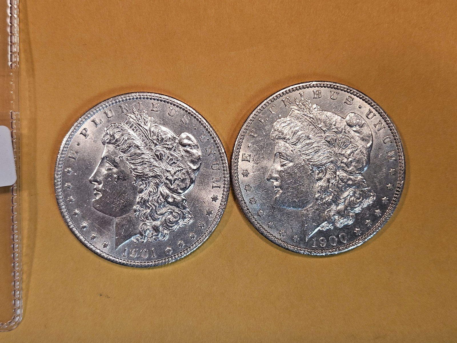 Two Brilliant About Uncirculated plus Morgan Silver Dollars (1 of 3)