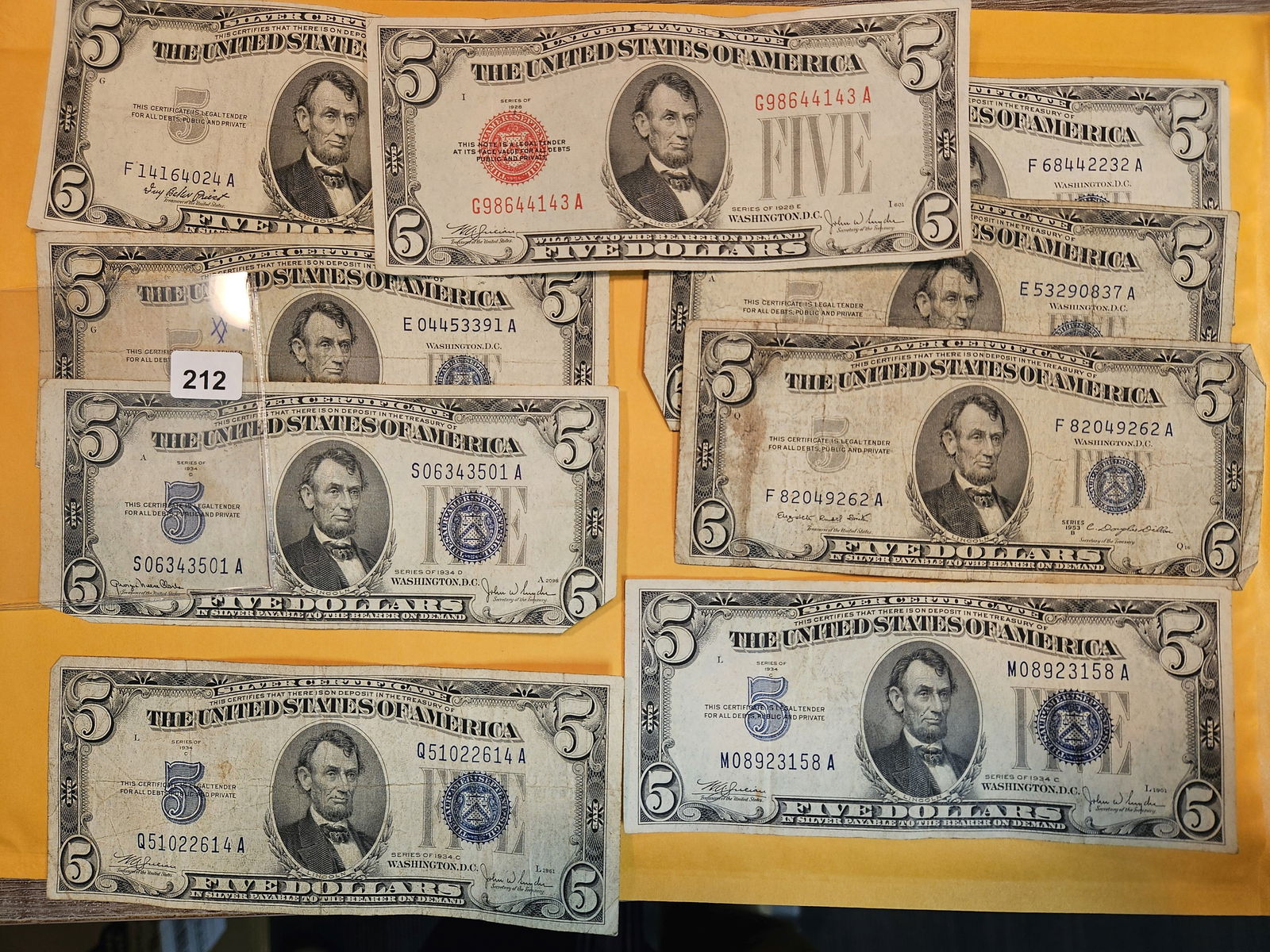 Nine mixed $5 notes (1 of 1)