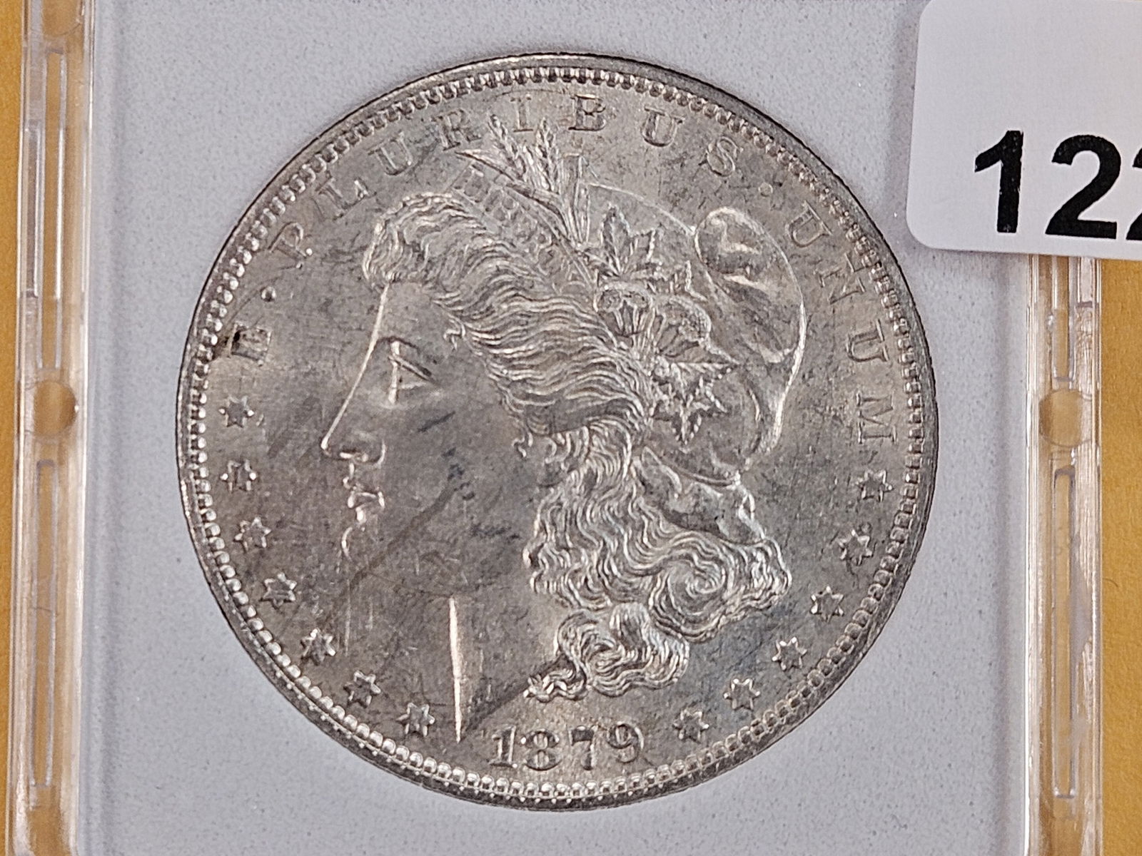 Slabbed Better Date 1879-O Morgan Silver Dollar: Brilliant About Uncirculated to Brilliant Uncirculated 