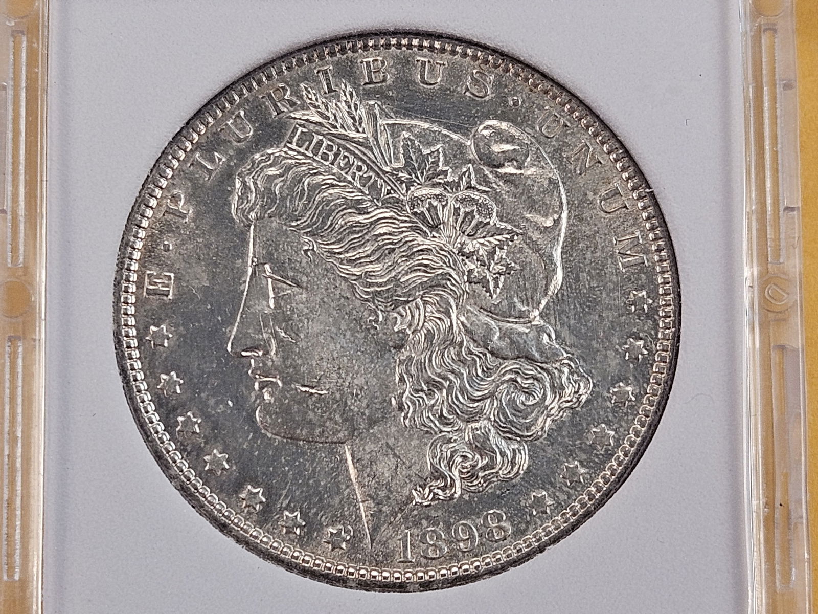 Slabbed 1898 Morgan Silver Dollar: Brilliant About Uncirculated to Brilliant Uncirculated 