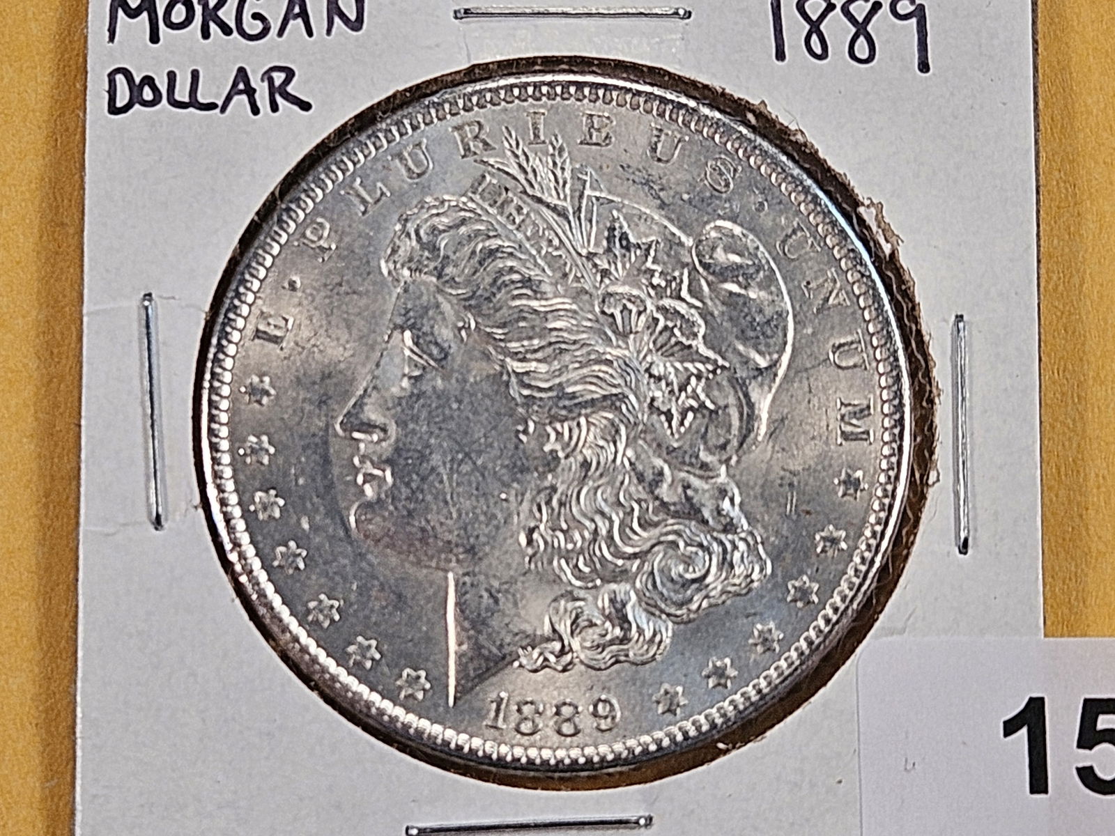 1889 Morgan Silver Dollar: About Uncirculated plus