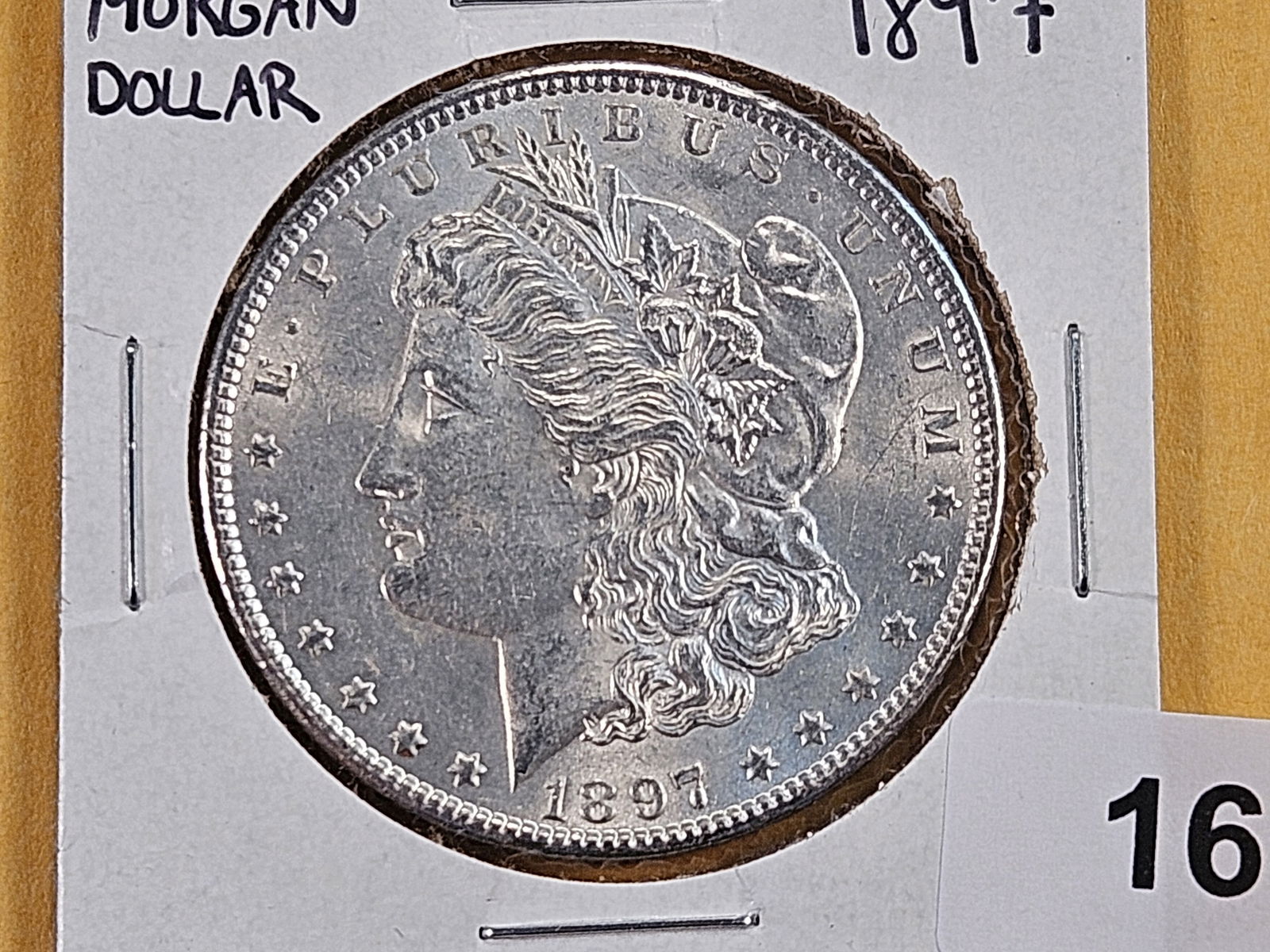1897 Morgan Silver Dollar: Brilliant About Uncirculated