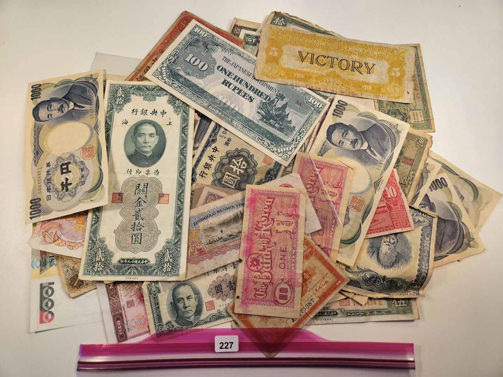 Fifty-Five Mixed Circulated Foreign Notes (1 of 5)