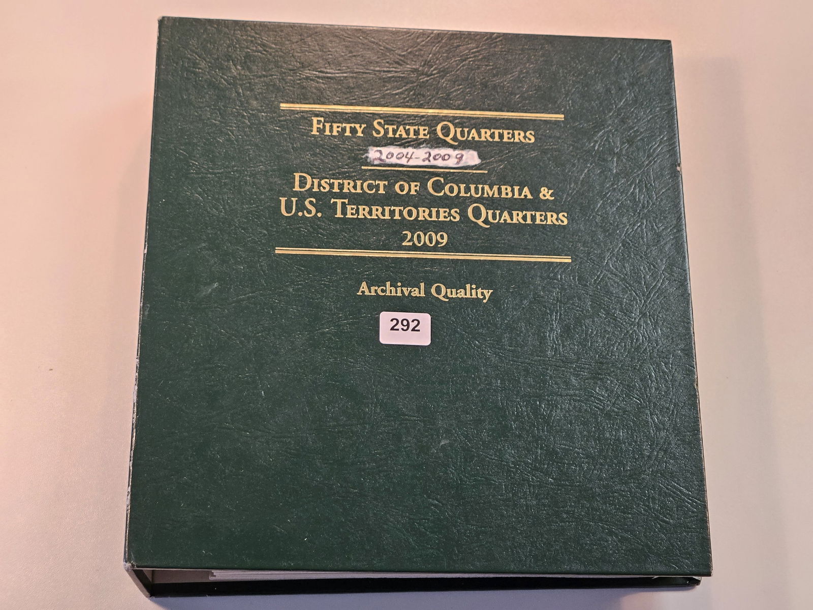 Mostly Filled Fifty State Quarter Littleton Coin Album: 2004-2009. Includes Proof and Business strikes. 87 total Quarters 