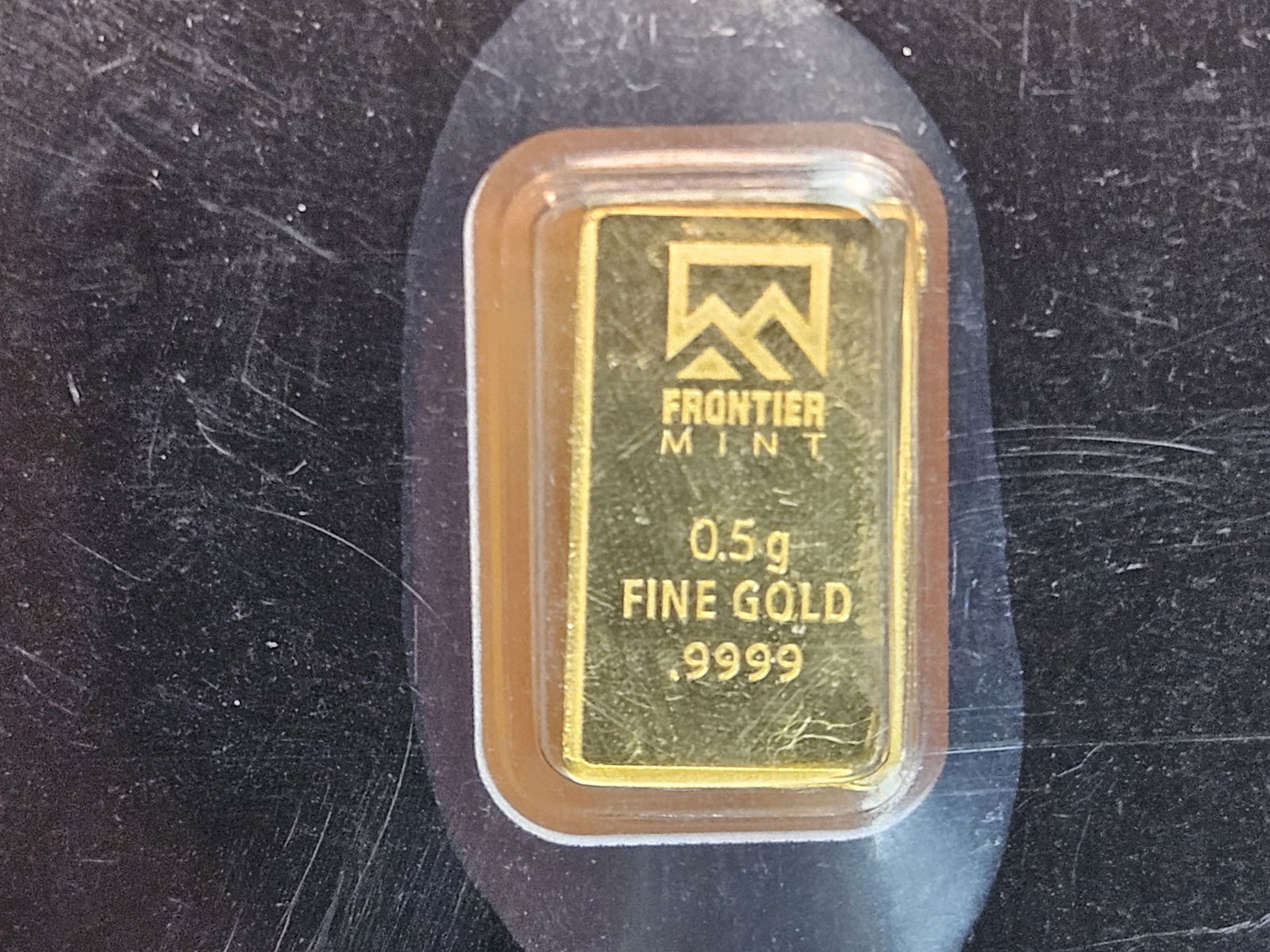 GOLD! Frontier Mint One-Half Gram .9999 fine Gold bar: In assay holder 