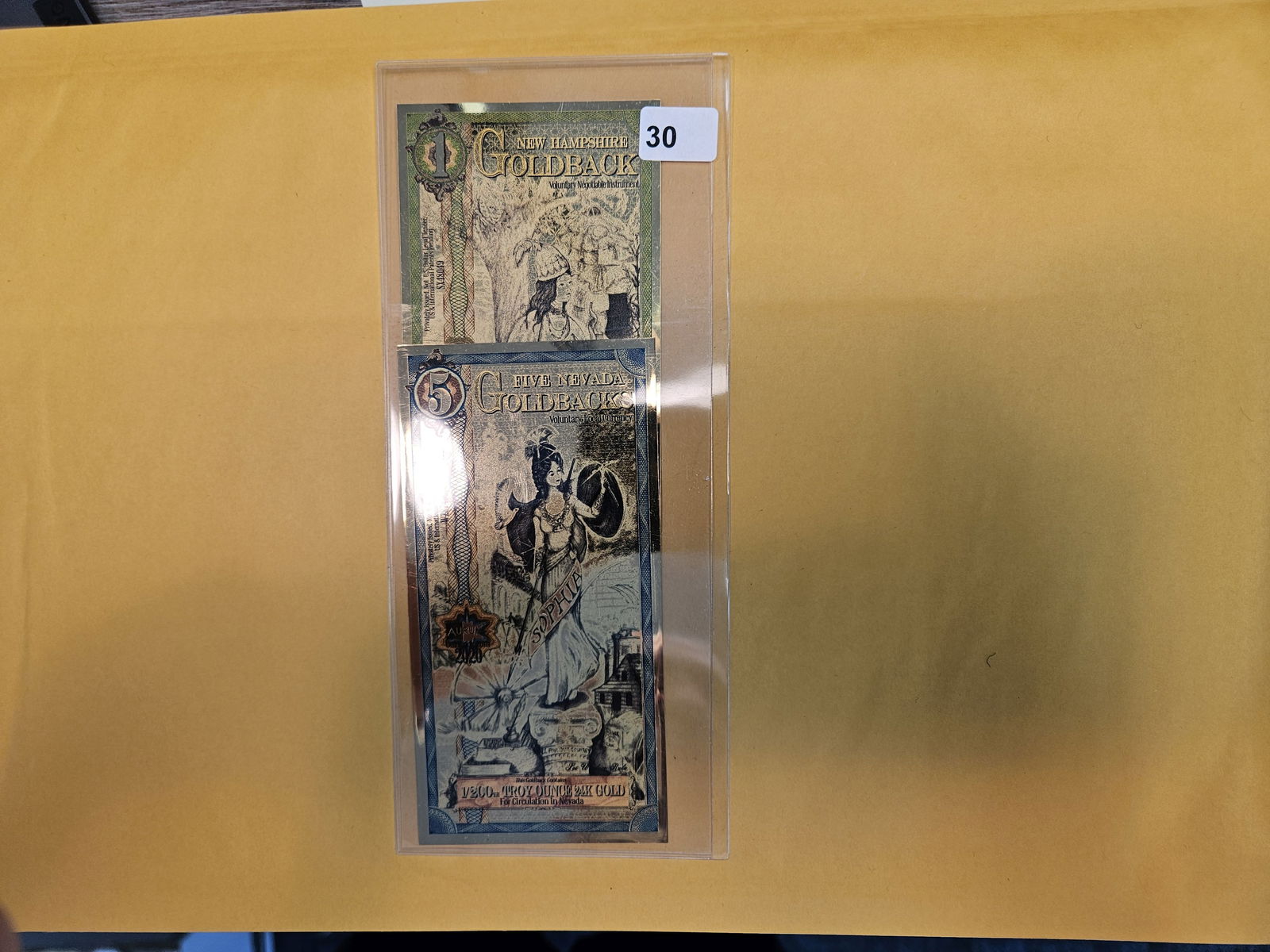 GOLD! Two different Goldbacks: One dollar Goldback from New Hampshire and Five Dollar Goldback from Nevada 