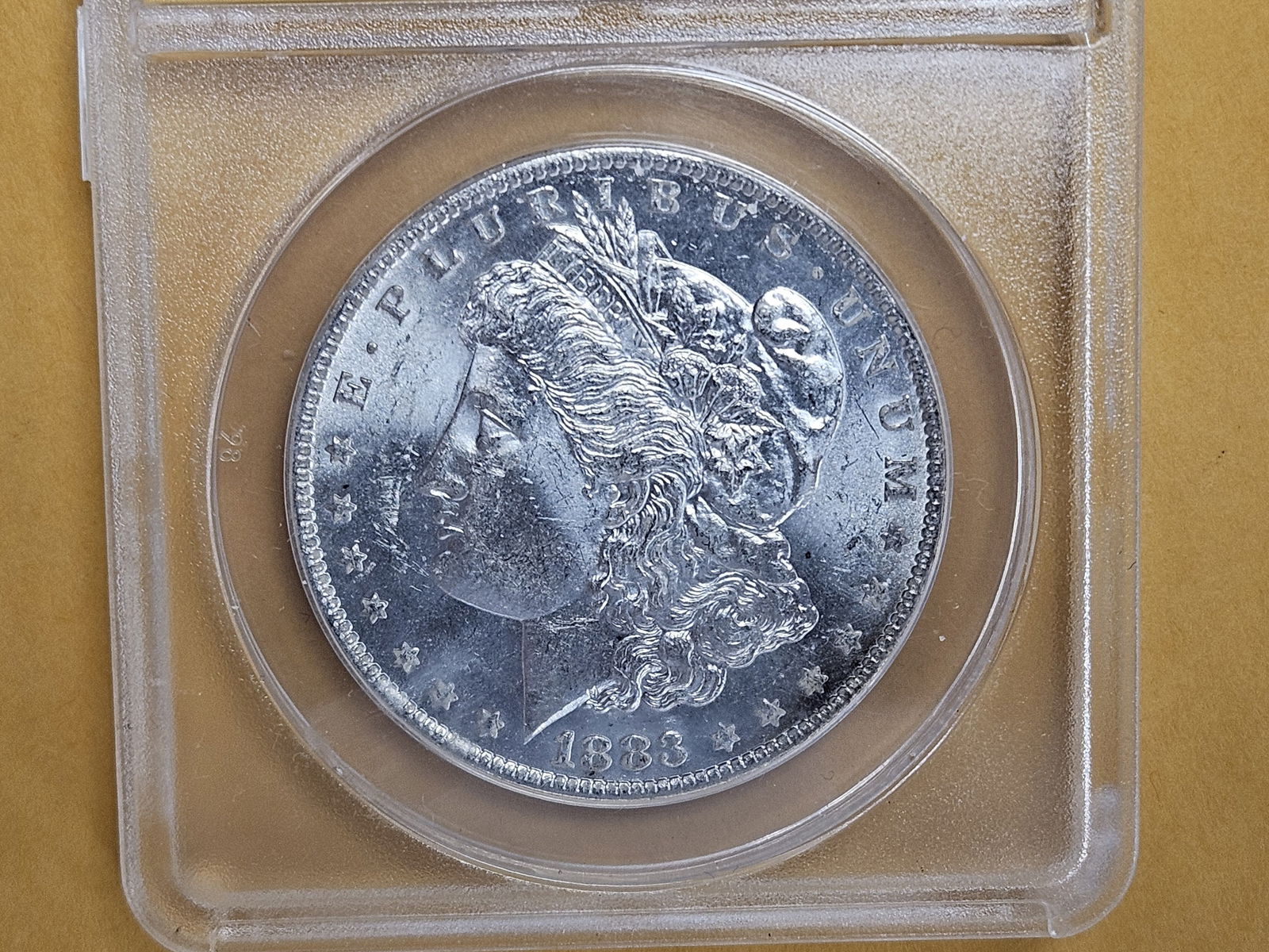ANACS 1883-O Morgan silver Dollar in Mint State 62 (1 of 3)