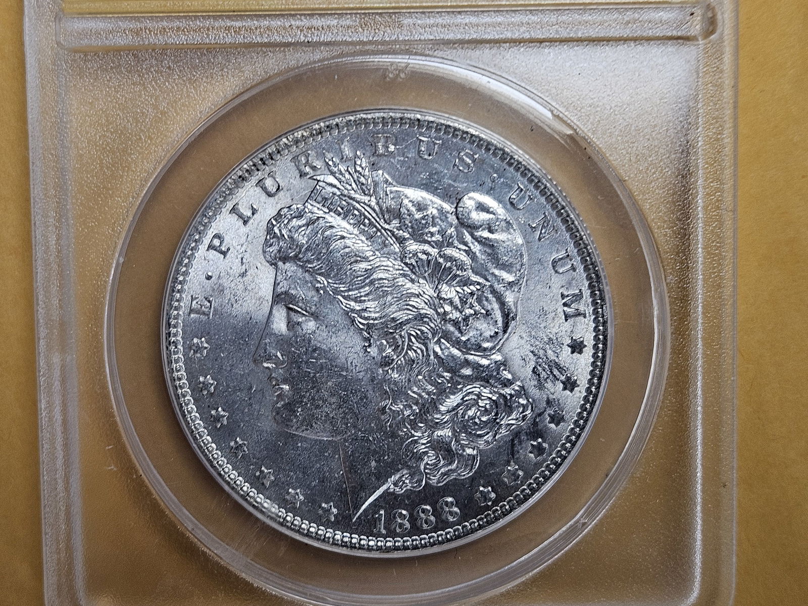 ANACS 1888 Morgan Dollar in Mint State 62 (1 of 3)