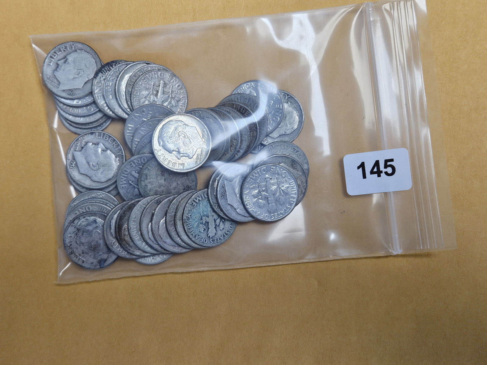 Fifty mixed Silver Roosevelt dimes (1 of 2)