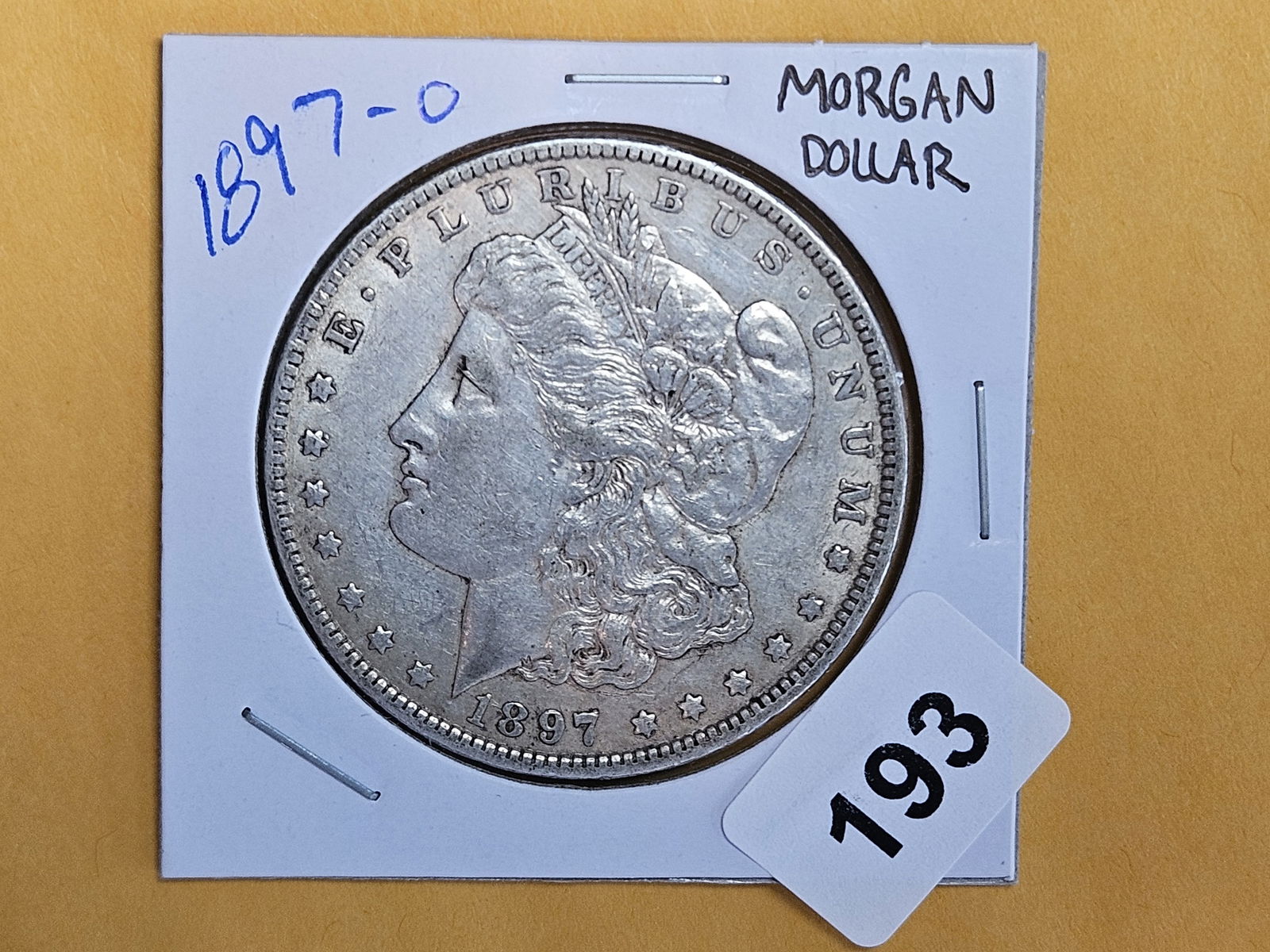 1897-O Morgan silver Dollar in About Uncirculated (1 of 3)