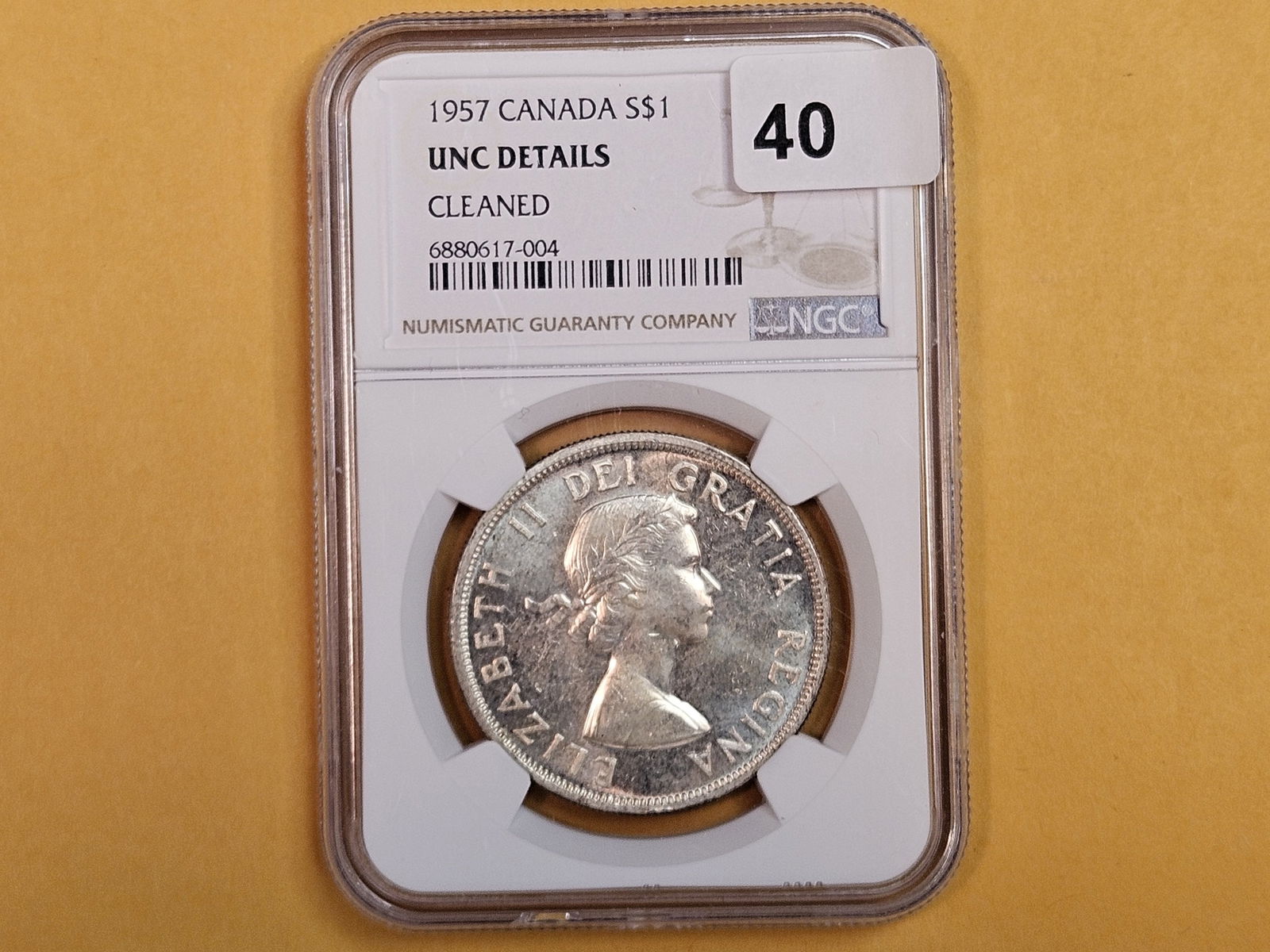 NGC 1957 Canada Silver Dollar in Brilliant Uncirculated - details (1 of 2)