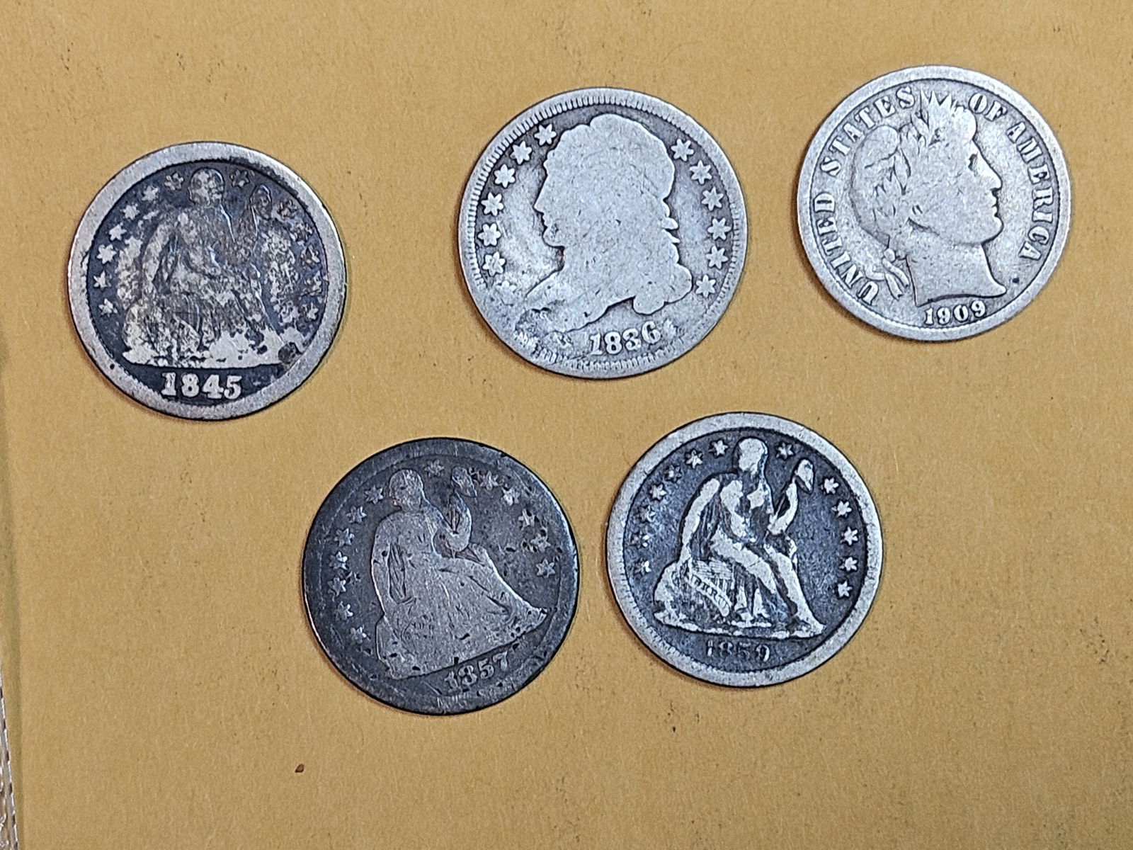 Five mixed silver Dimes (1 of 3)