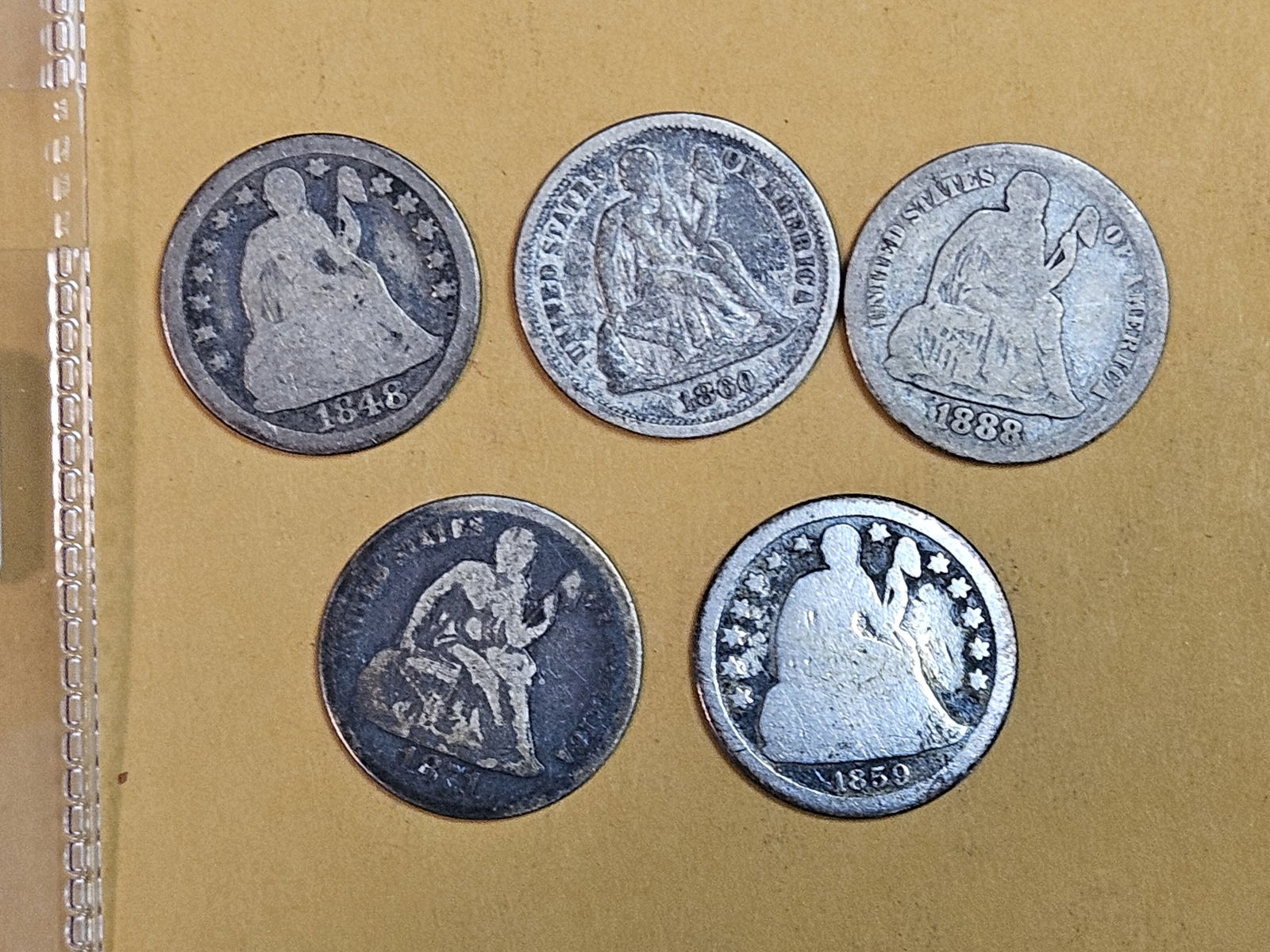 Five mixed silver Dimes (1 of 3)