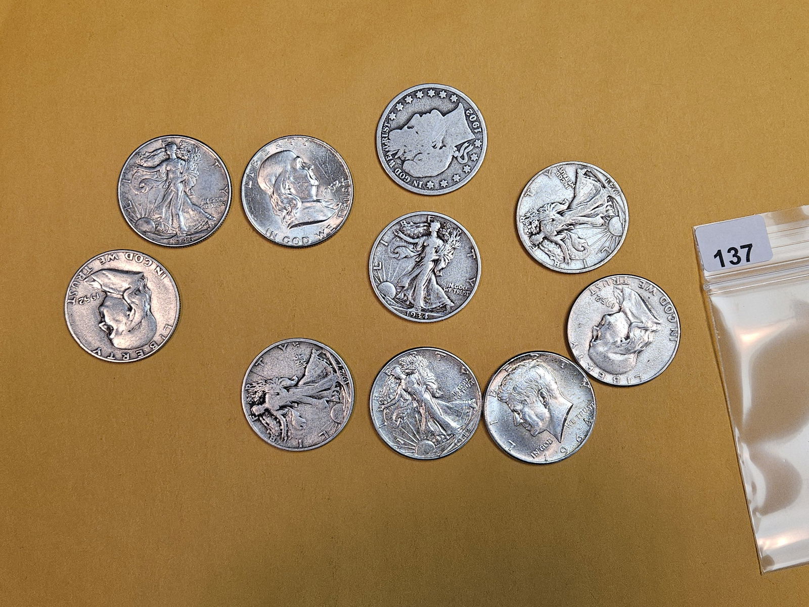 Ten mixed silver Half Dollars: Walkers, Kennedy and Barber 