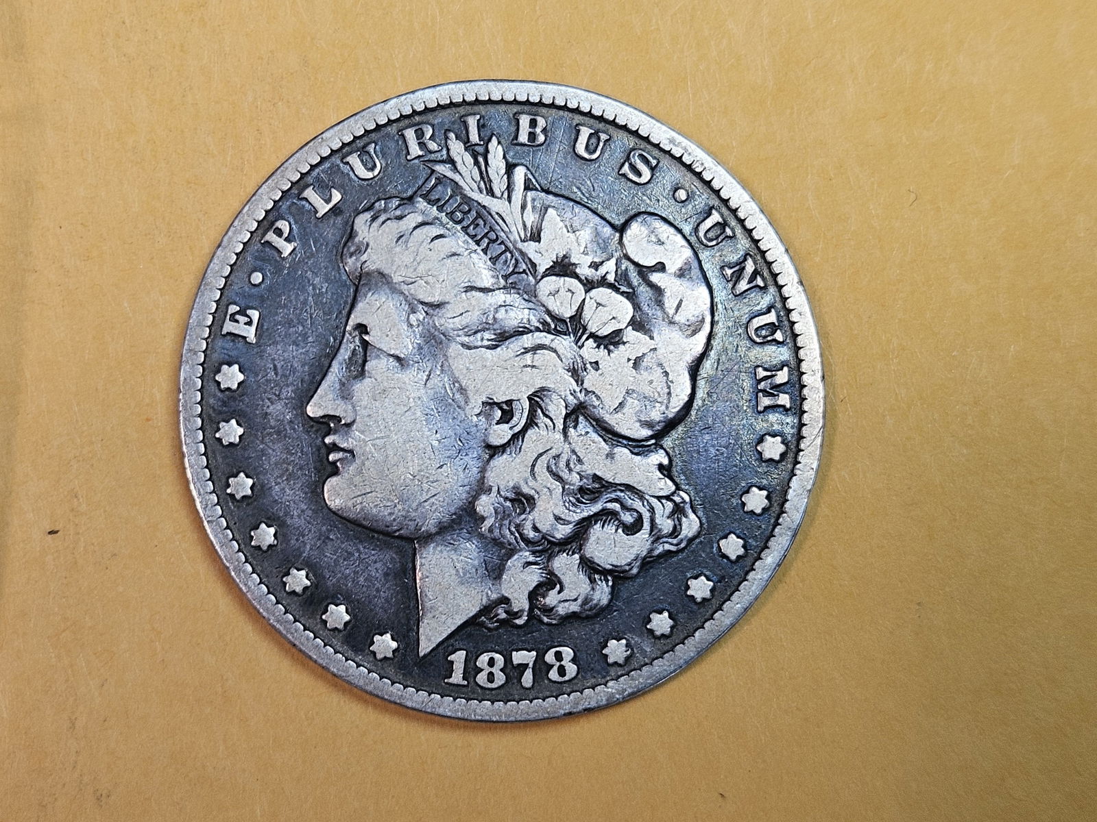 ** KEY DATE ** 1878-CC Morgan Dollar in Fine - details (1 of 3)