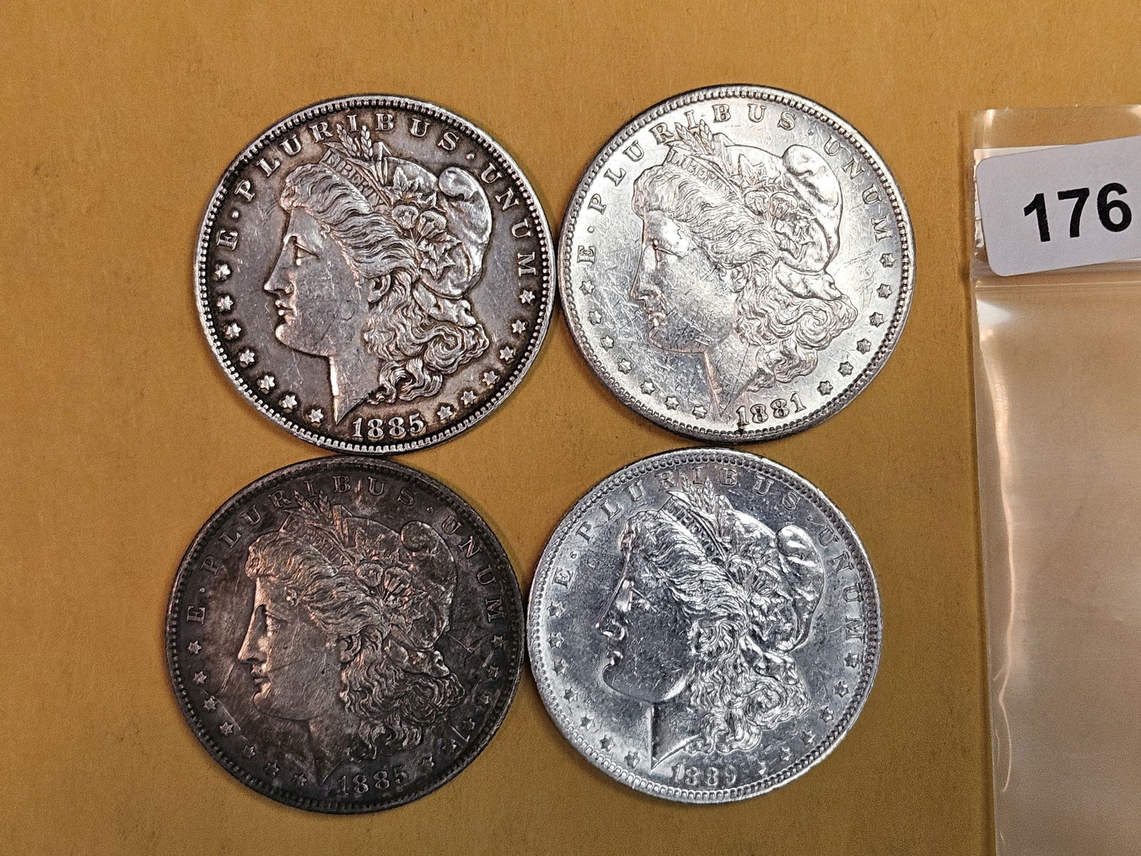Four About Uncirculated Morgan Silver Dollars (1 of 3)