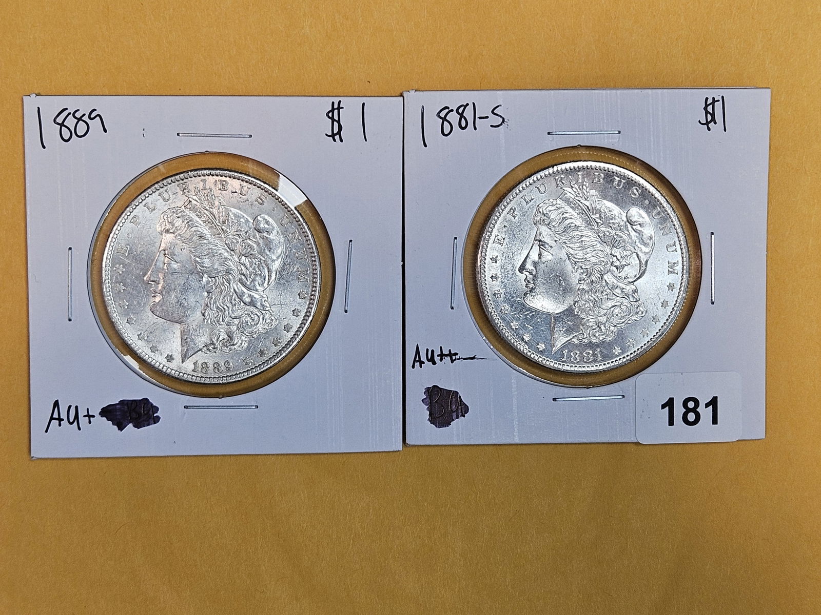 Two Brilliant About Uncirculated plus Morgan silver Dollars (1 of 3)