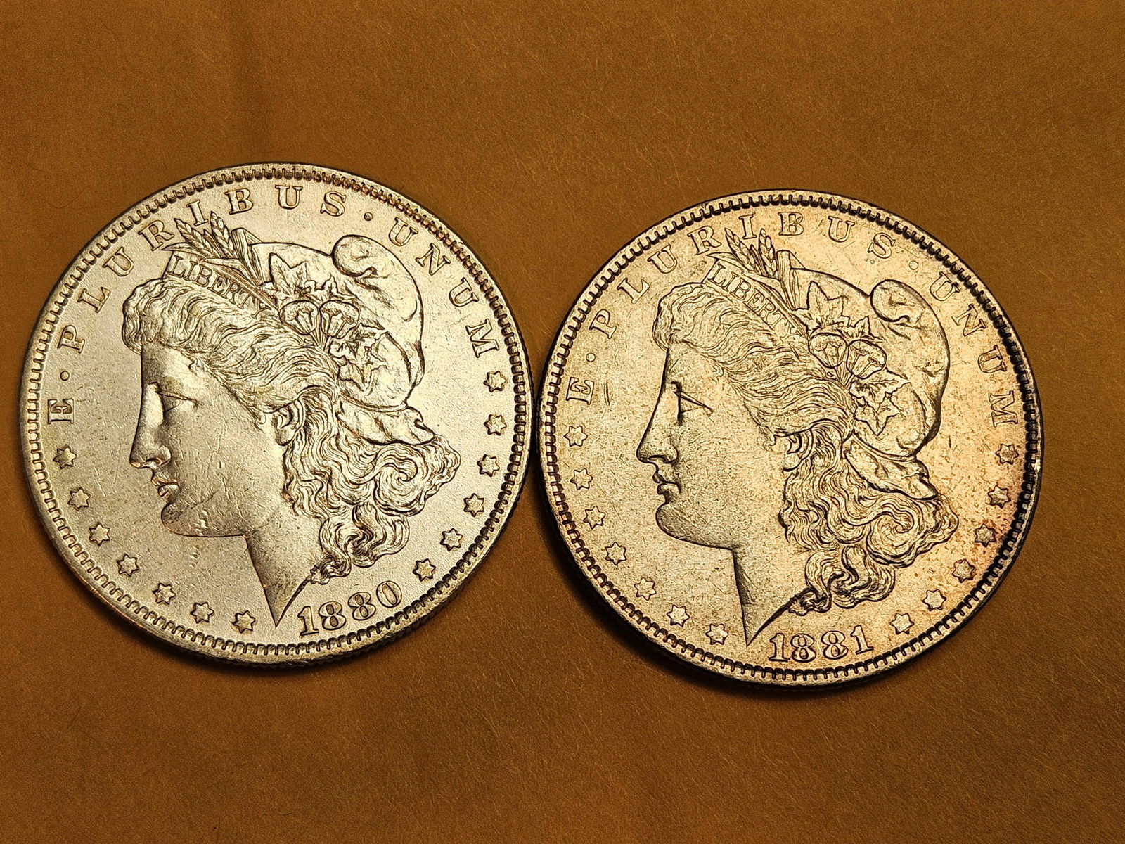 Two Brilliant About Uncirculated plus Morgan silver Dollars (1 of 3)