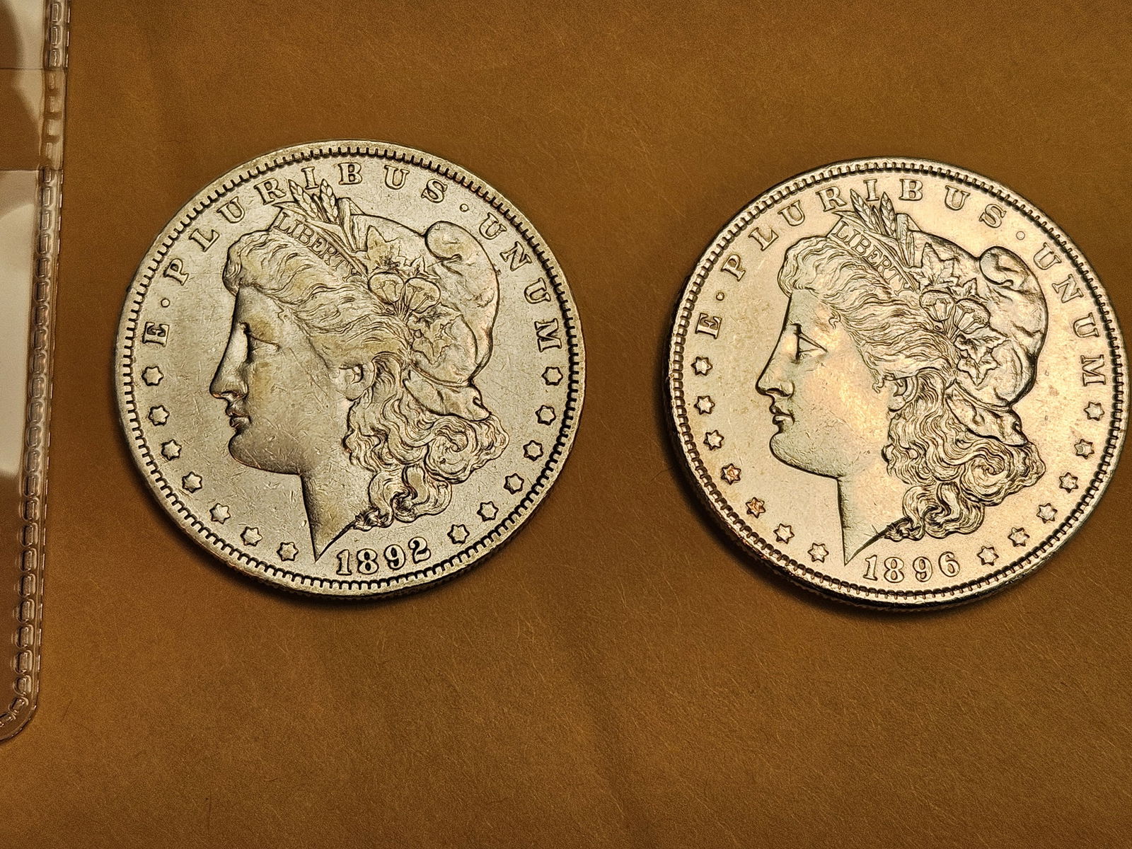 Two Brilliant About Uncirculated plus Morgan silver Dollars (1 of 3)