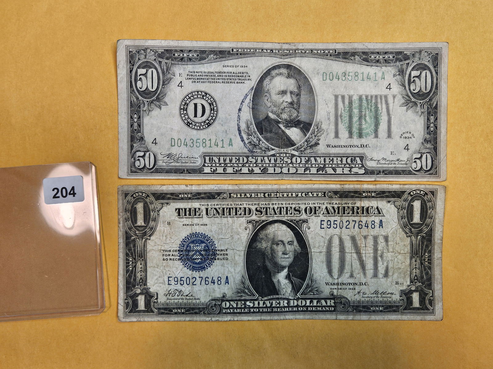 Series of 1928 One Dollar Silver Certificate FUNNY BACK and Series 1934 Fifty Dollar FRN (1 of 2)