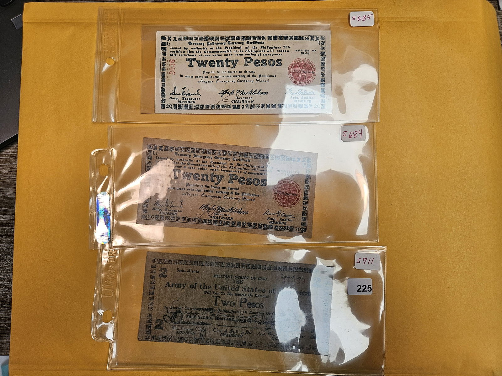 Three Two and Twenty Pesos notes: Treasury Emergency Currency Certificates and Military Script of 1943 