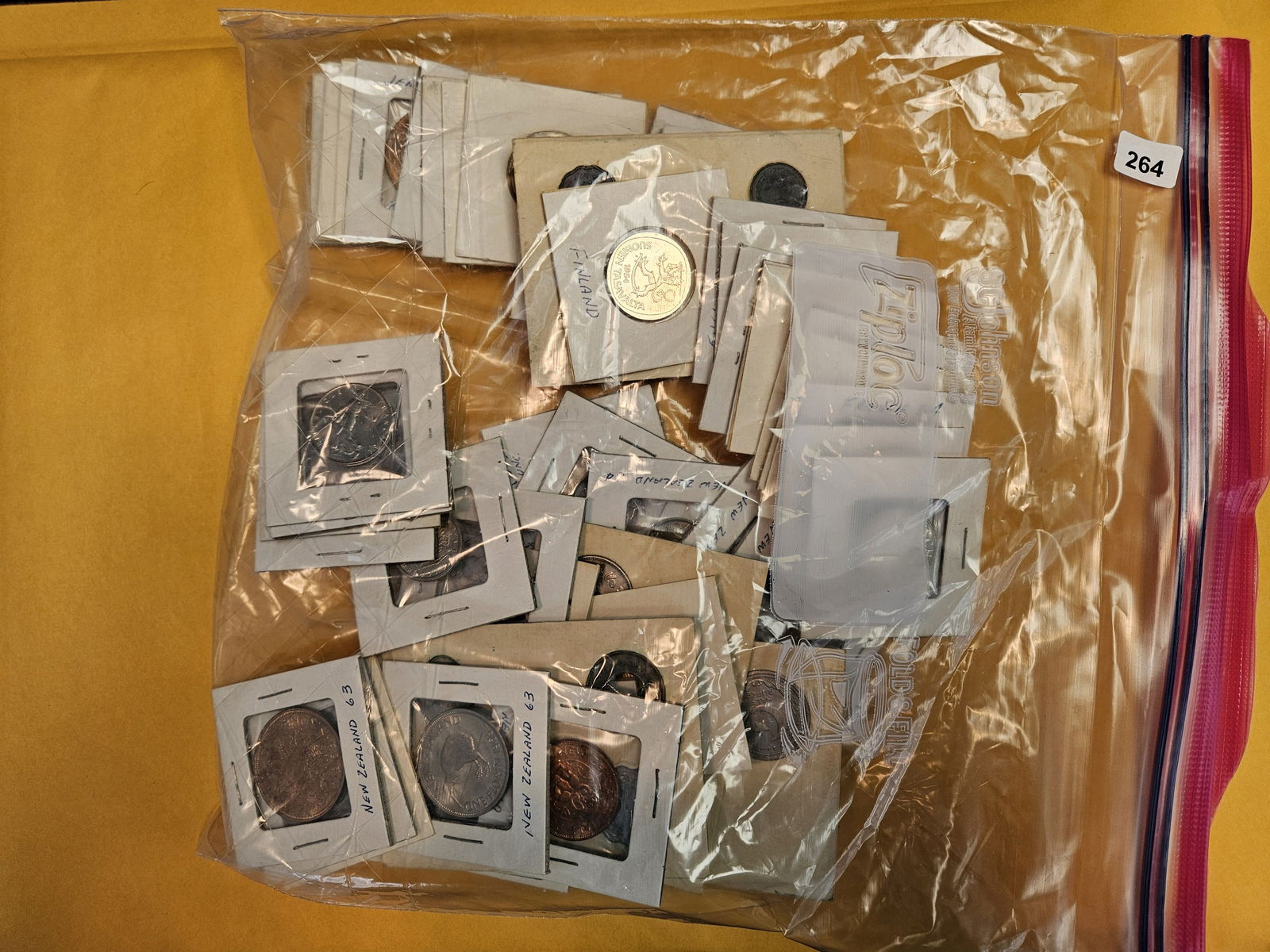 Mix of World coins all in 2x2 holders (1 of 3)