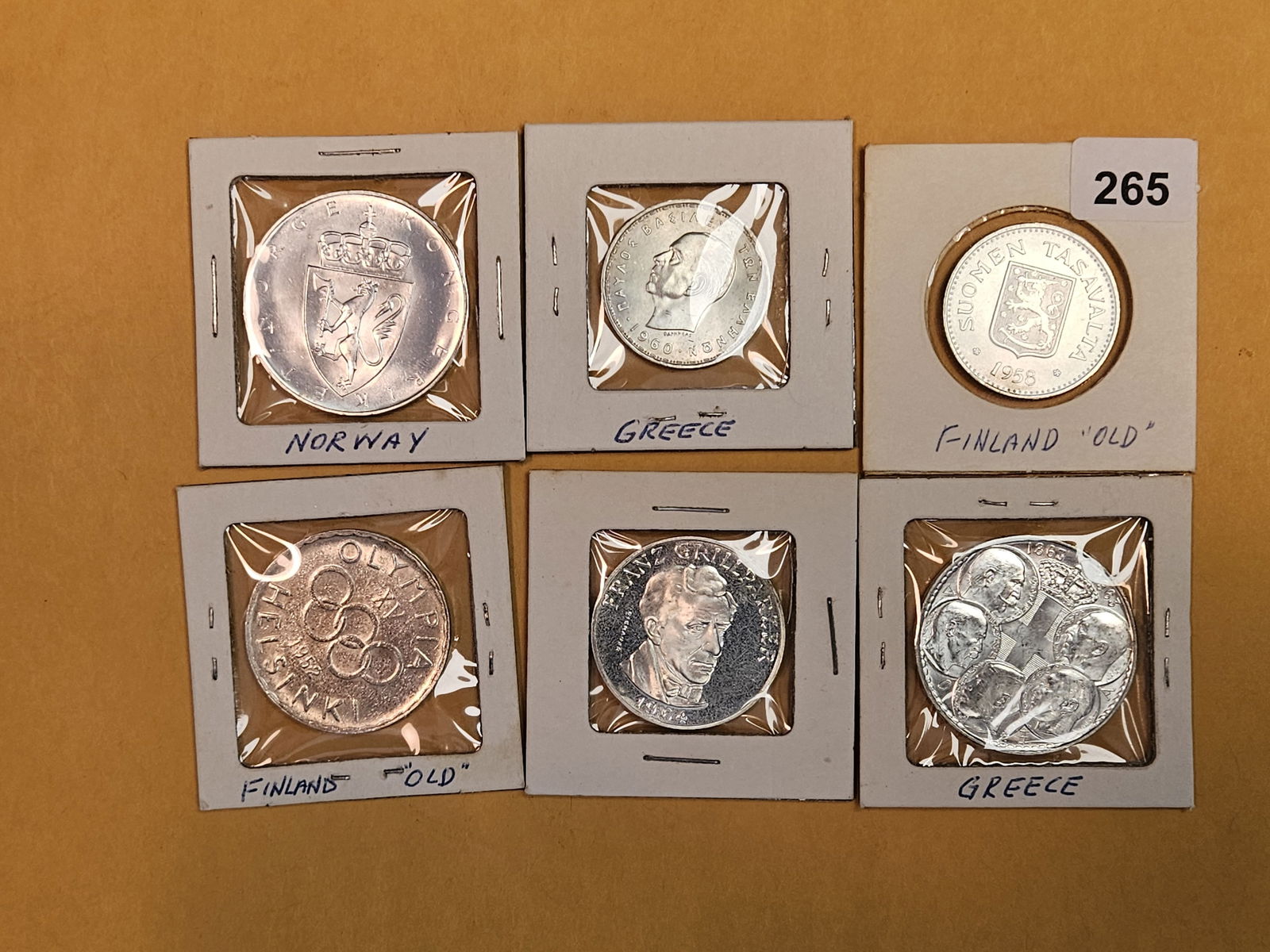 Six GEM Brilliant Uncirculated Silver World coins (1 of 7)