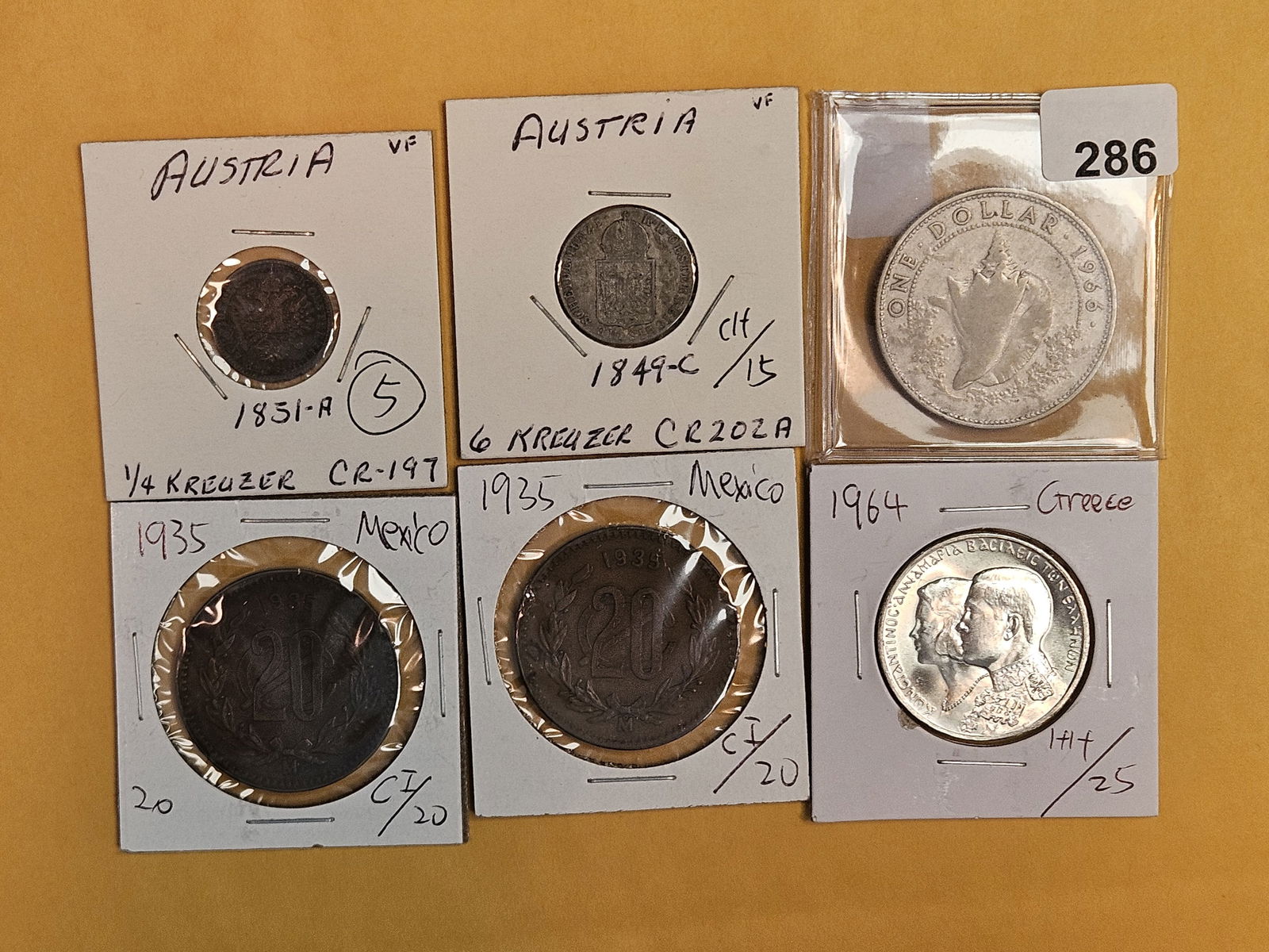 Six little better silver and copper World coins (1 of 8)
