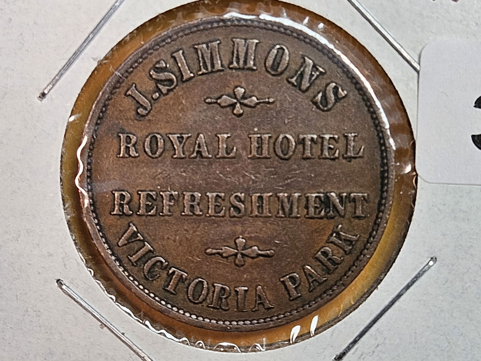 Choice AU-UNC London 4 pence Merchant's token: J. Simmons Royal Hotel. Victoria Park, London 