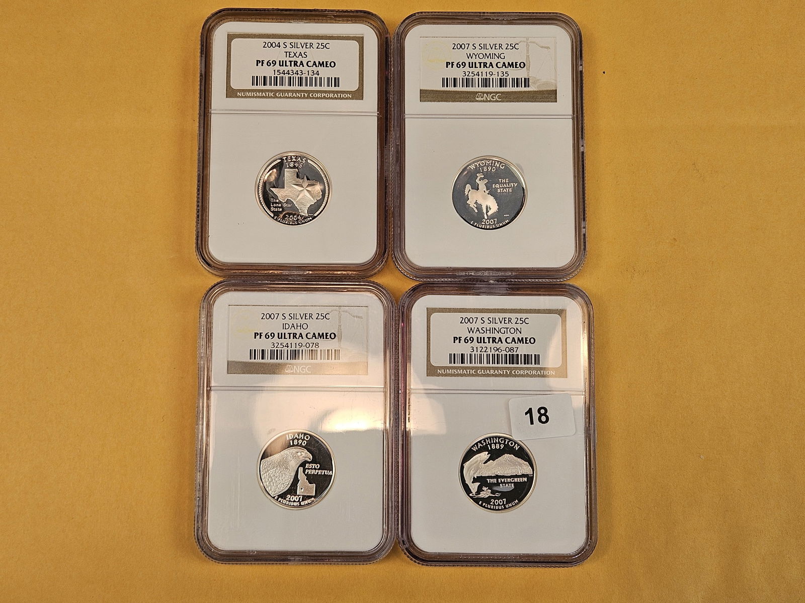 Four NGC-graded SILVER Quarters in Proof 69 Ultra Cameo (1 of 2)