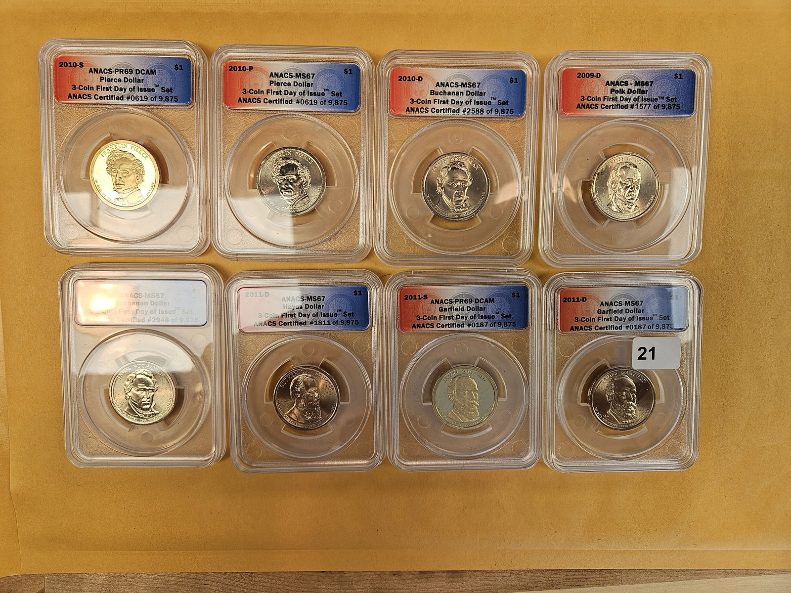 Eight ANACS-graded Presidential Dollars (1 of 3)