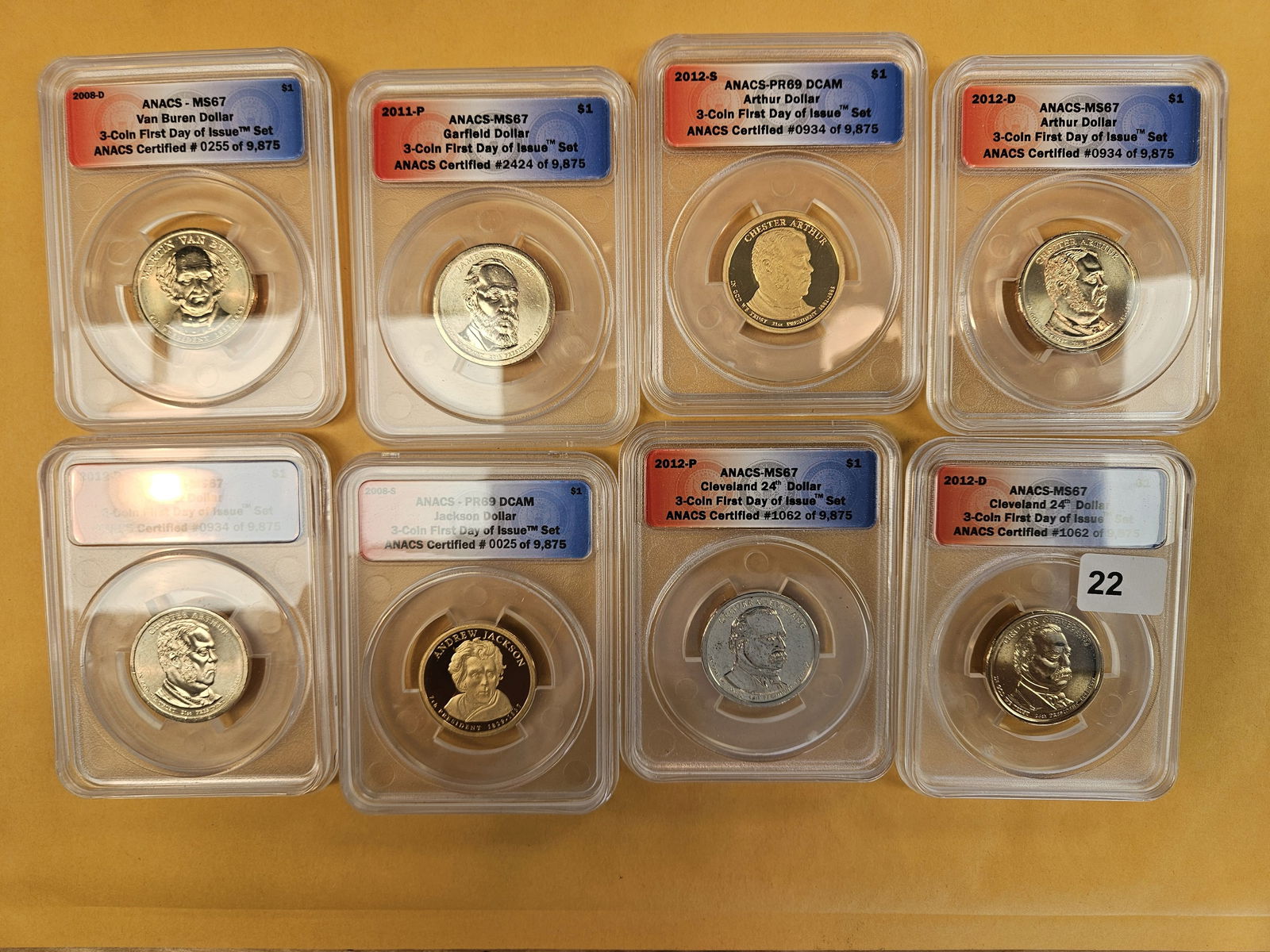Eight ANACS-graded Presidential Dollars (1 of 3)