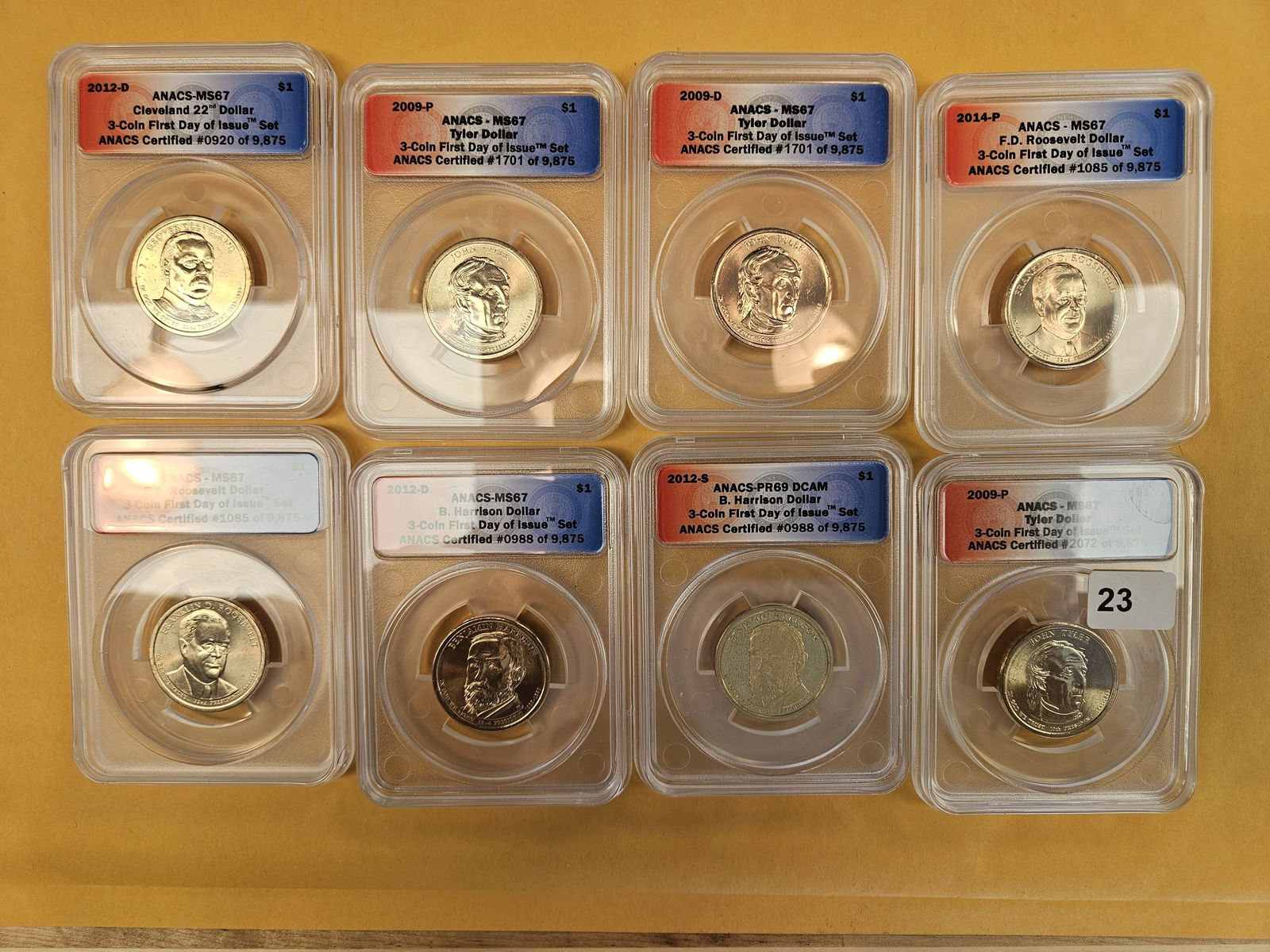 Eight ANACS-graded Presidential Dollars (1 of 3)