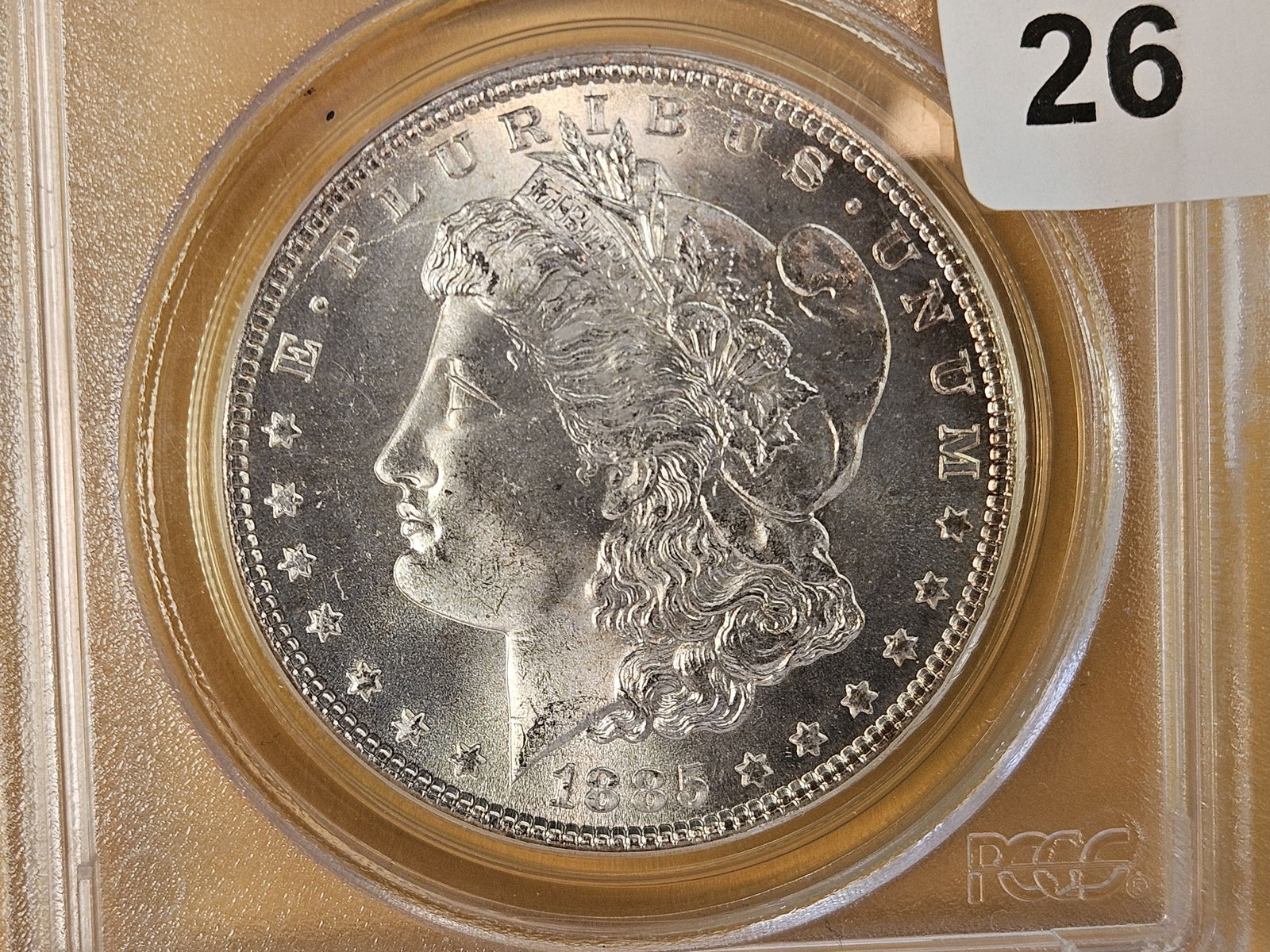 GEM! PCGS 1885 Morgan Dollar in Mint State 66: Old Green-yellowish holder 