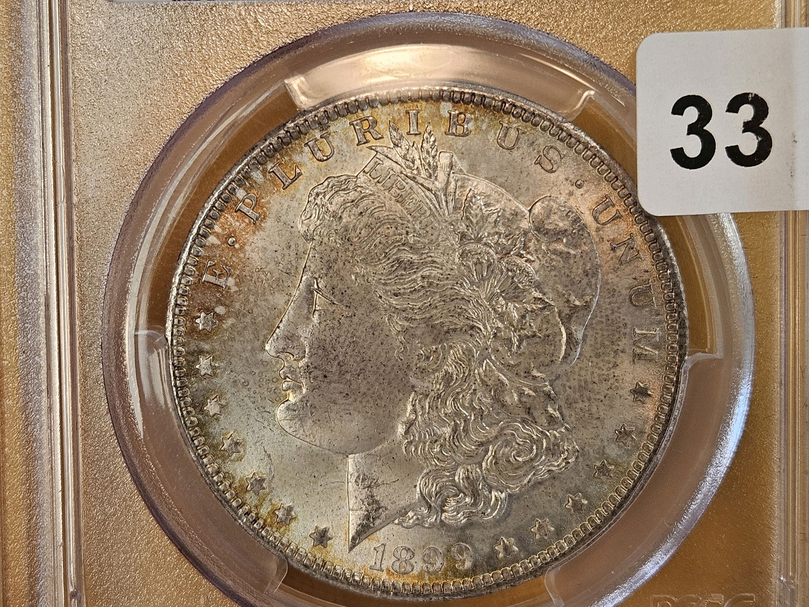 PCGS 1899-O Morgan Dollar in Mint State 64 (1 of 4)