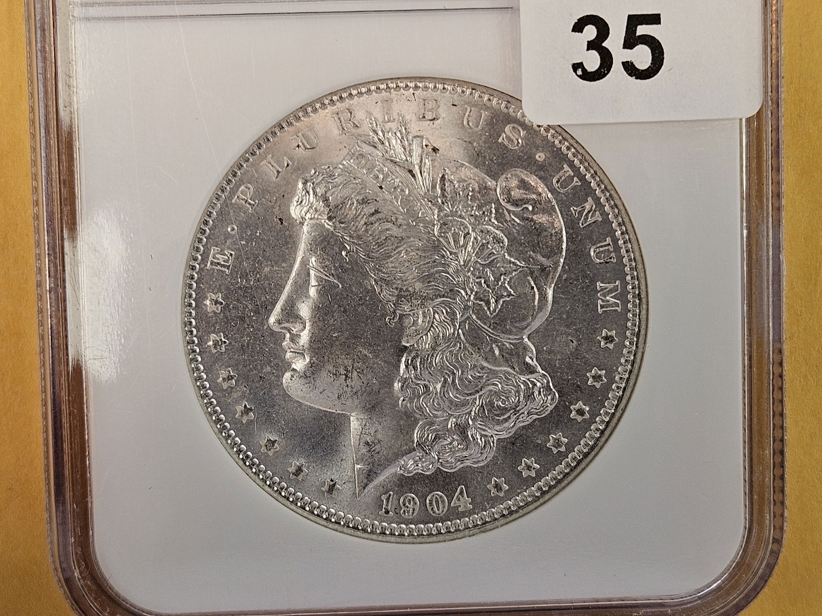 NGC 1904-O Morgan Dollar in Mint State 64 (1 of 5)