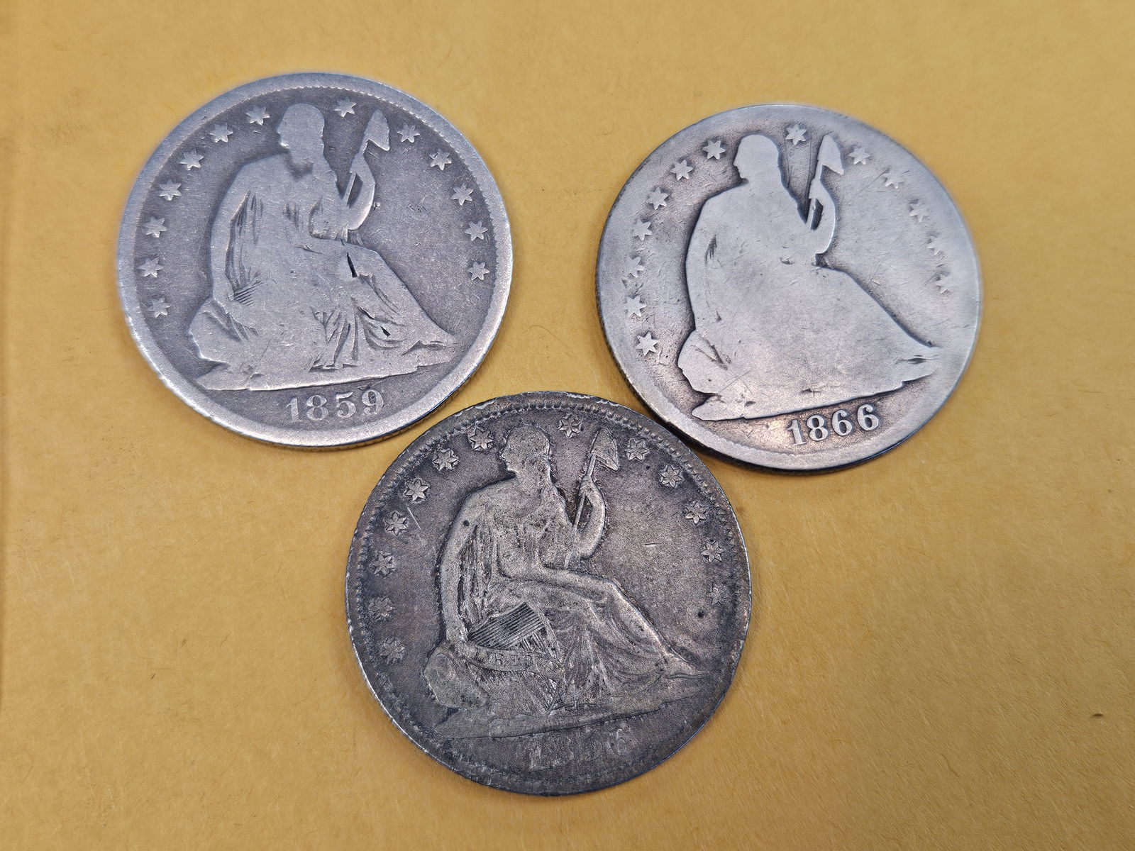 Three mixed Seated Liberty silver Half Dollars (1 of 5)