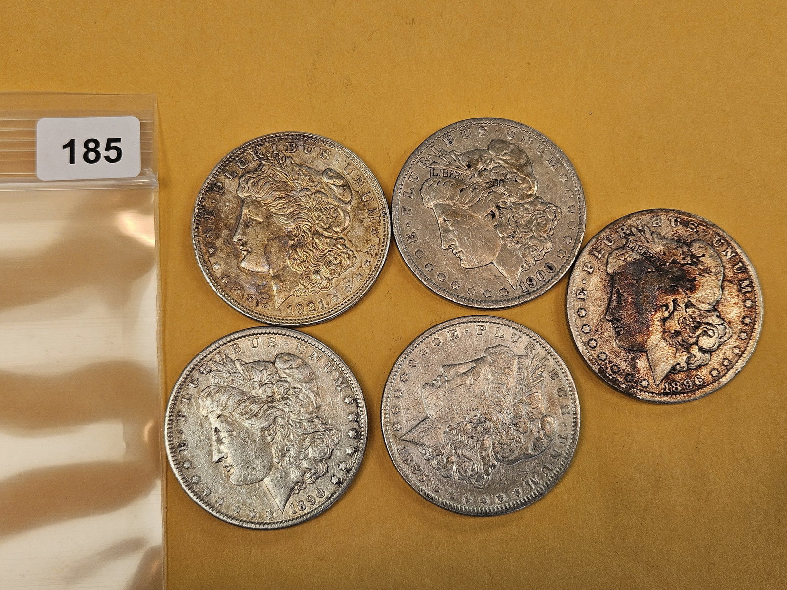 Five Mixed Morgan Silver Dollars (1 of 2)