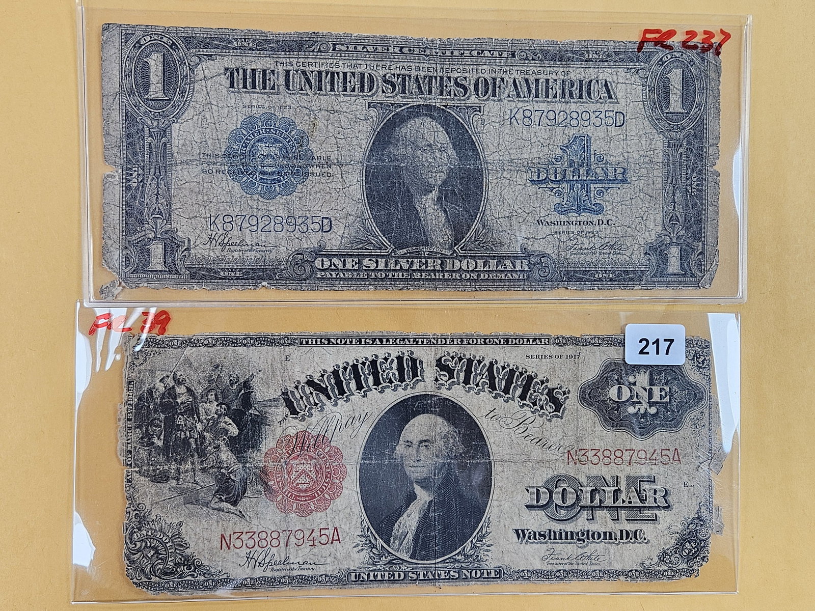 Two Large-size, older, One Dollar pieces of US Currency (1 of 2)
