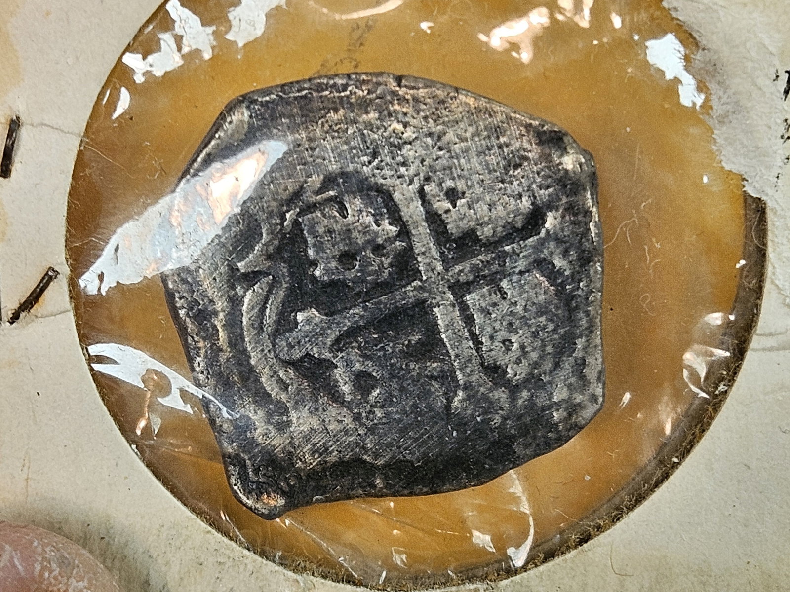 Early silver 4 reales: Piece of four. Minted in Vera Cruz, Mexico. Recovered from Spanish Galleon "El Infante" sunk July 15, 1773 