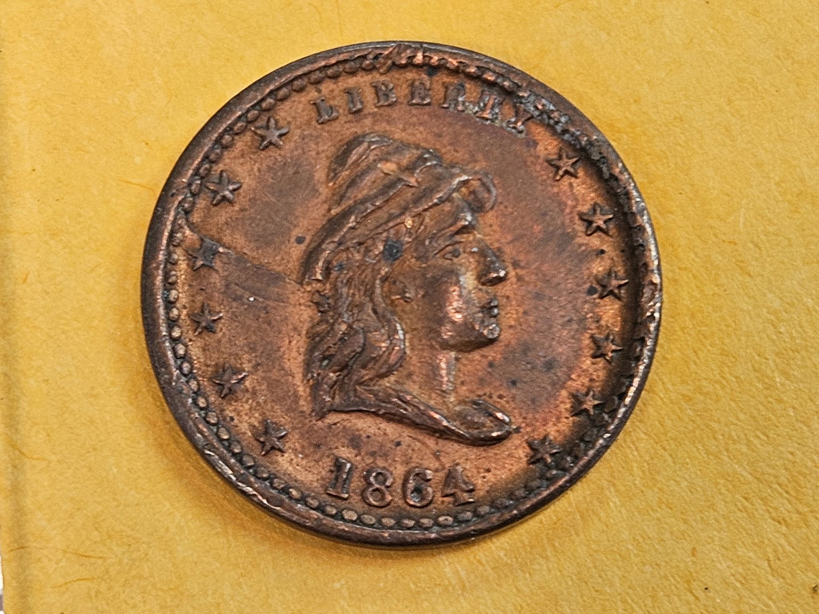 1864 Civil War Token in AU-UNC condition (1 of 5)